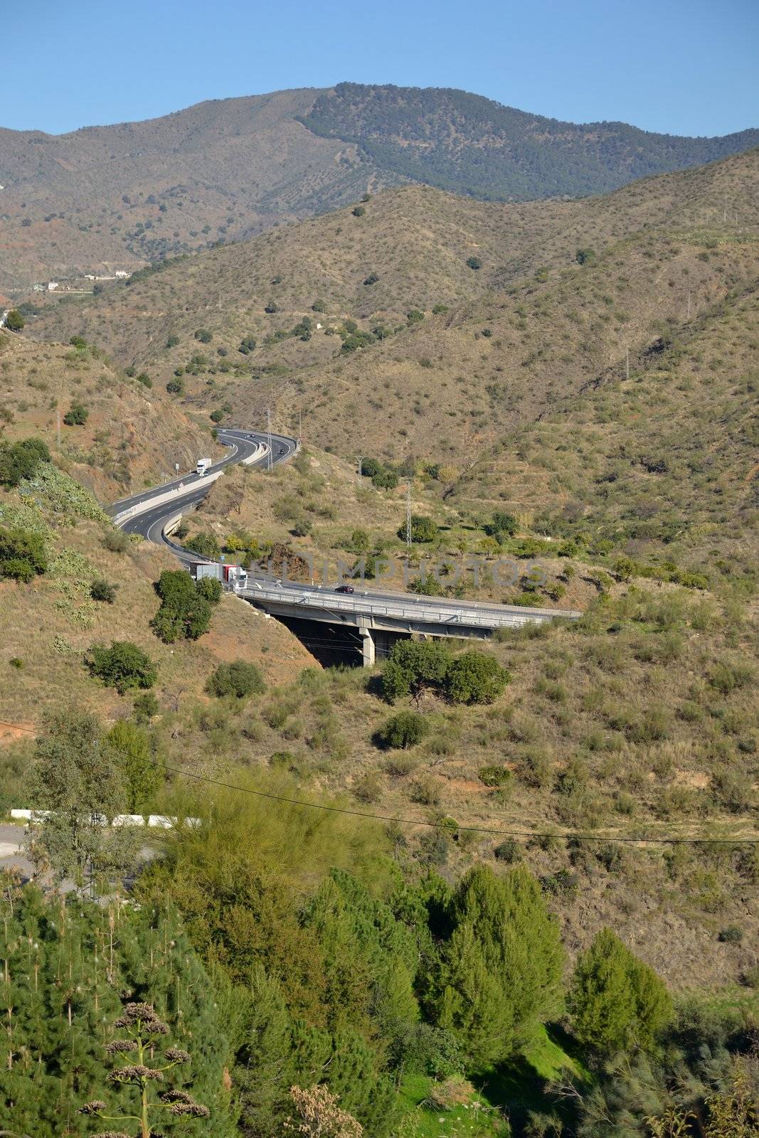 view from the mountain road leading over the city malaga