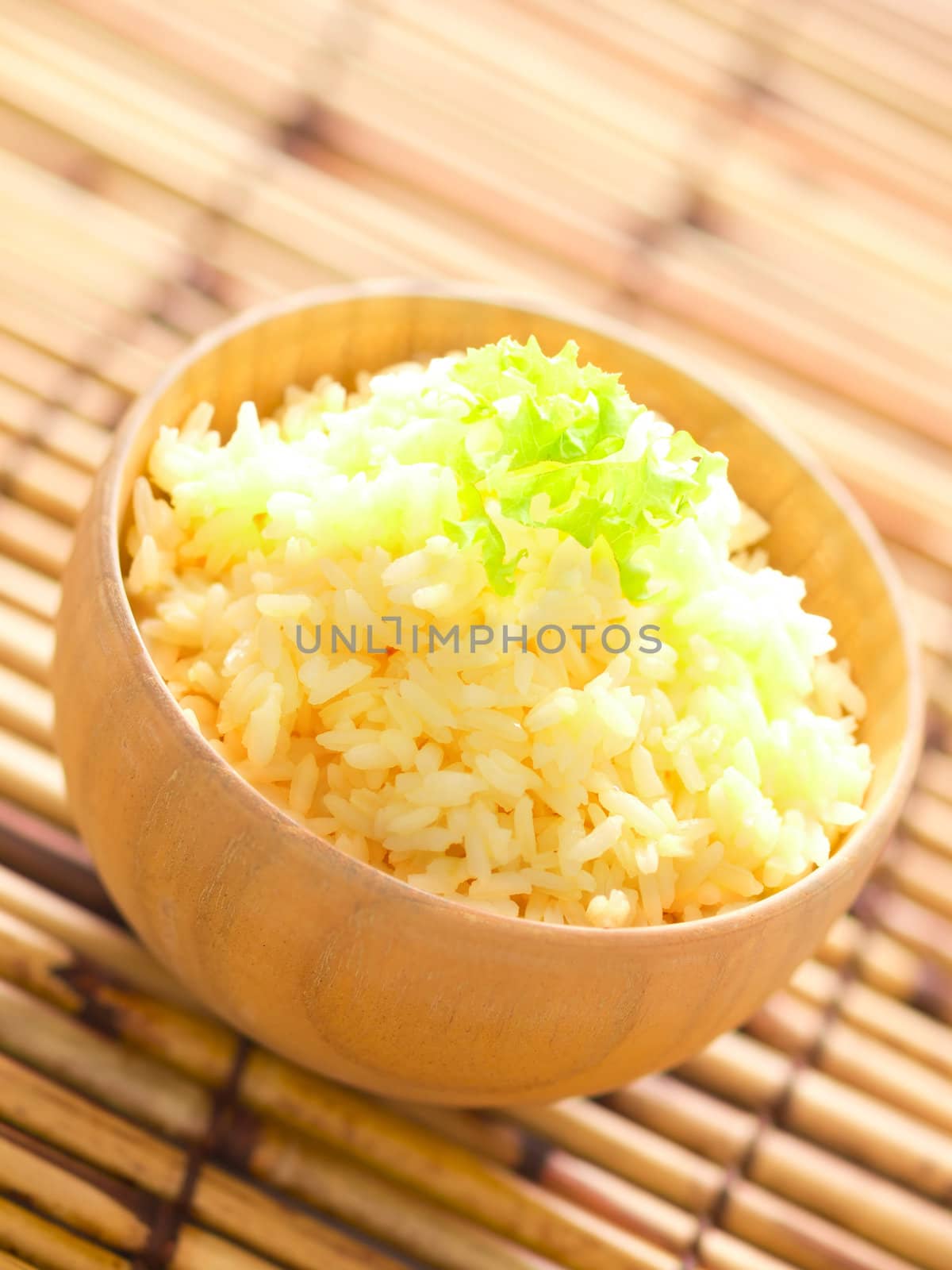 close up of a bowl of raw egg rice