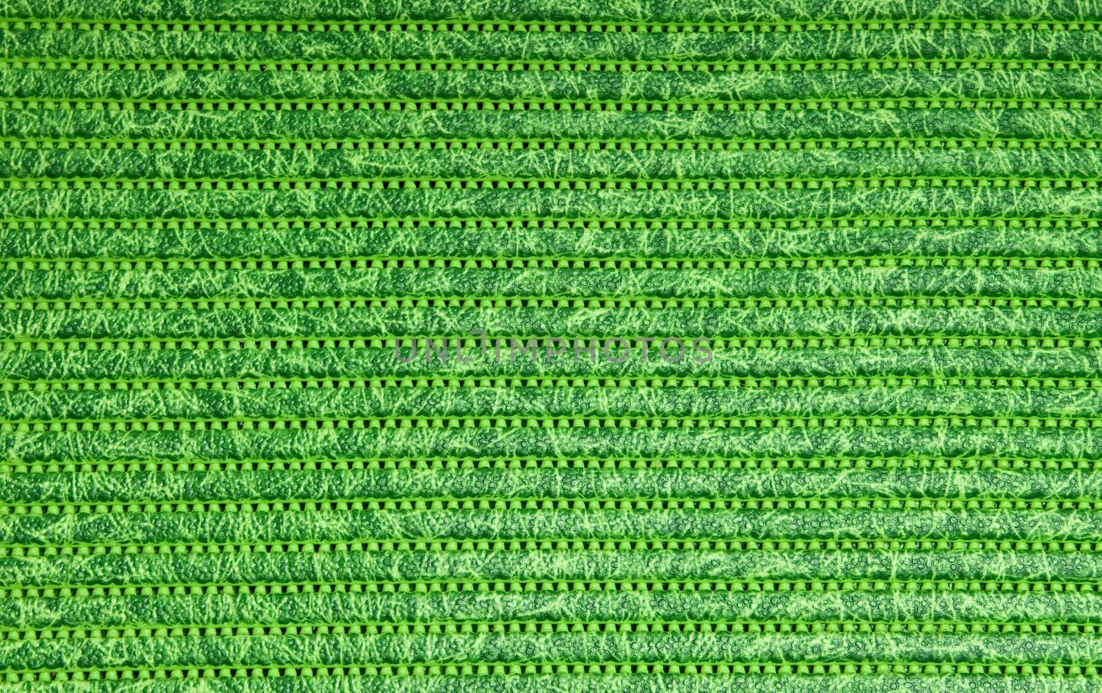 shooting close-up a green rubber mat 