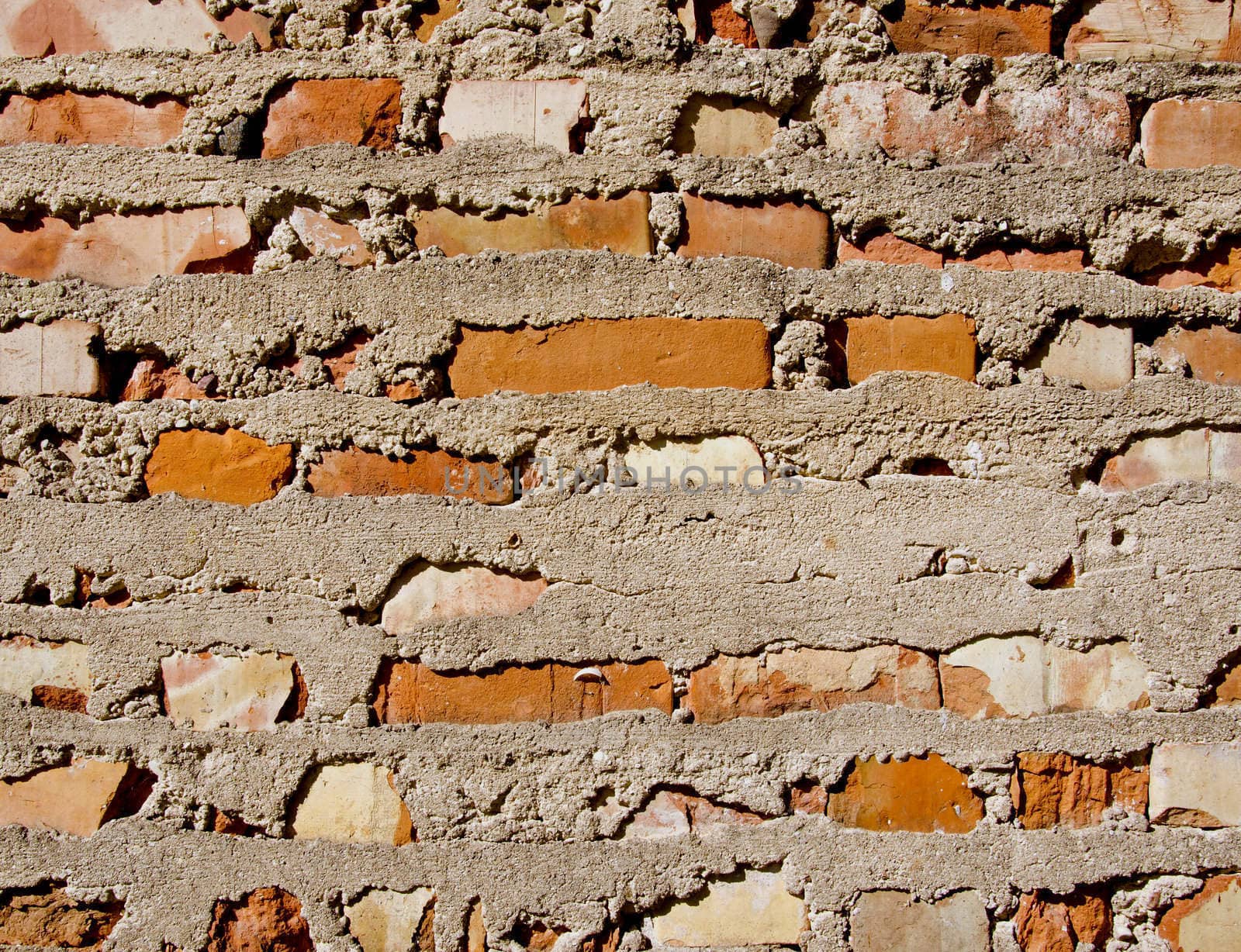 Old red brick and concrete wall backdrop background.