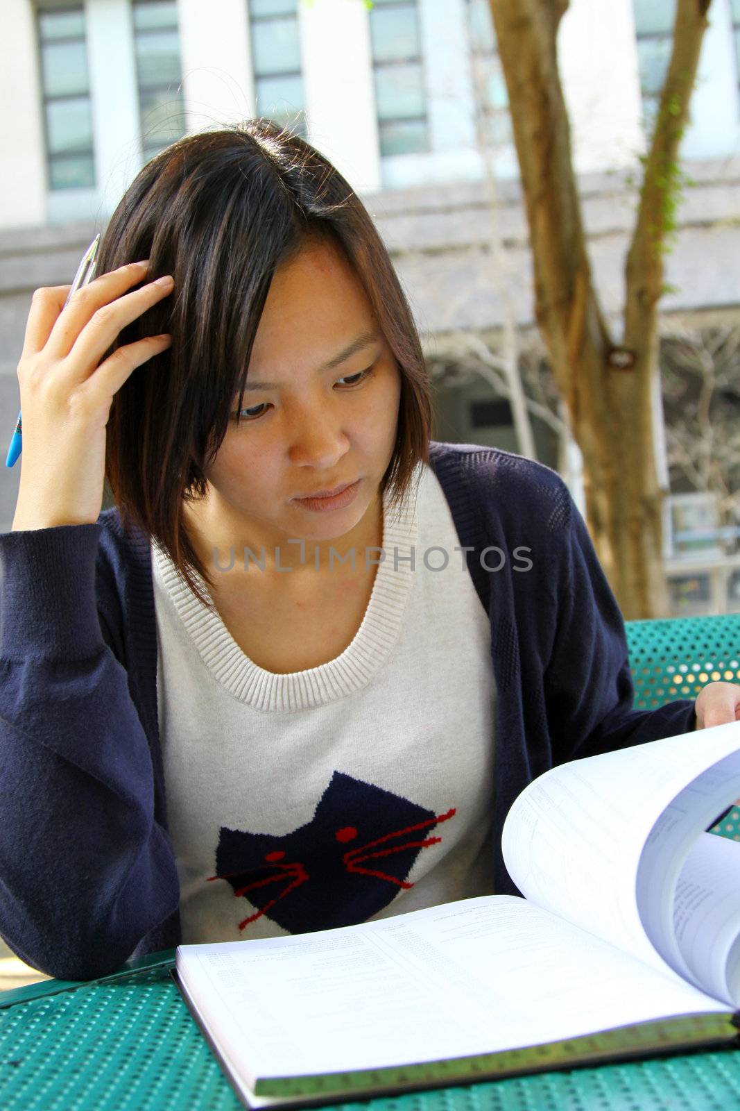 Asian girl studying in university