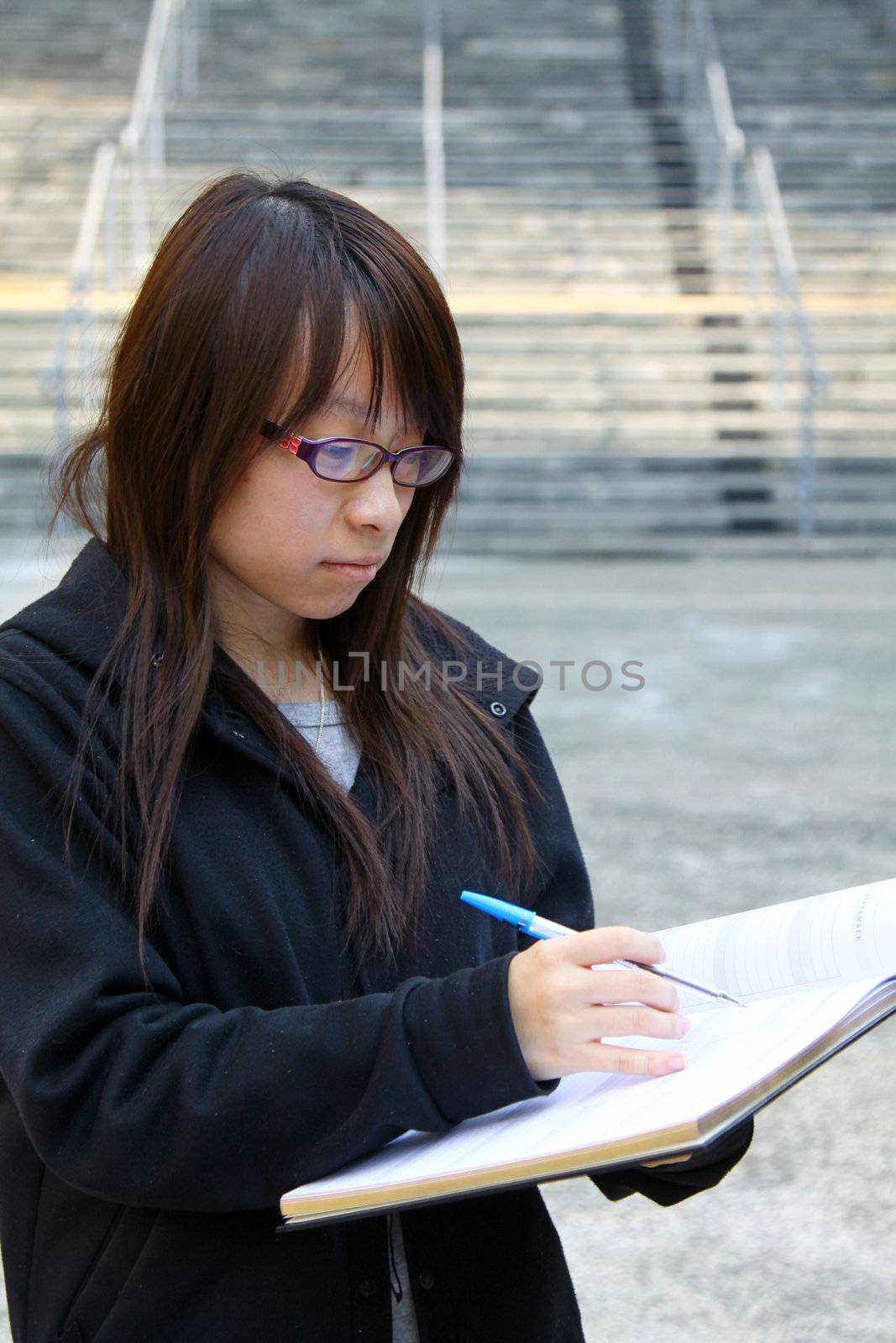 Asian girl studying in university