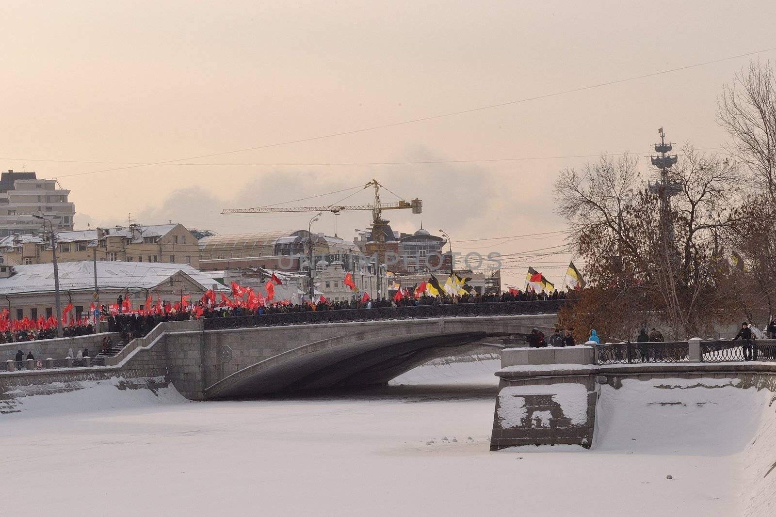 Moscow, view of the processing for the fair elections on Small Stone Bridge, February 4th, 2012 Red flags are communist, the others (yellow-white-black) old Russian imperial flags representing nationalists