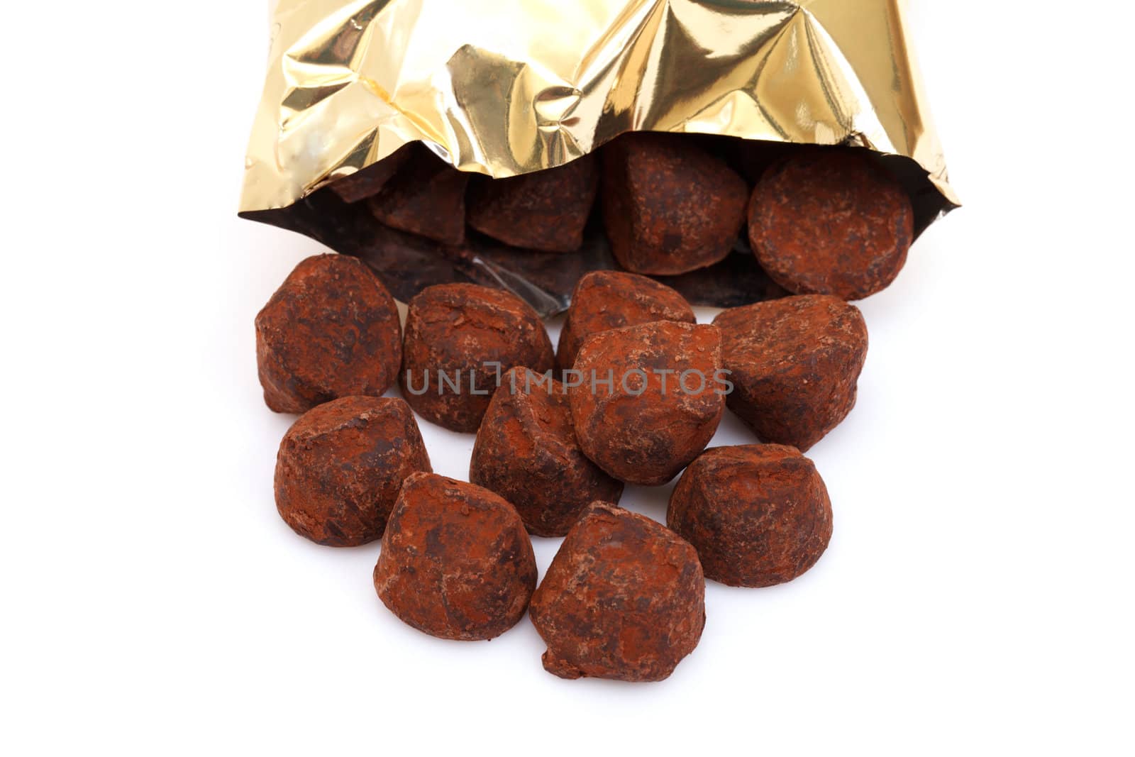 chocolate truffles on white background