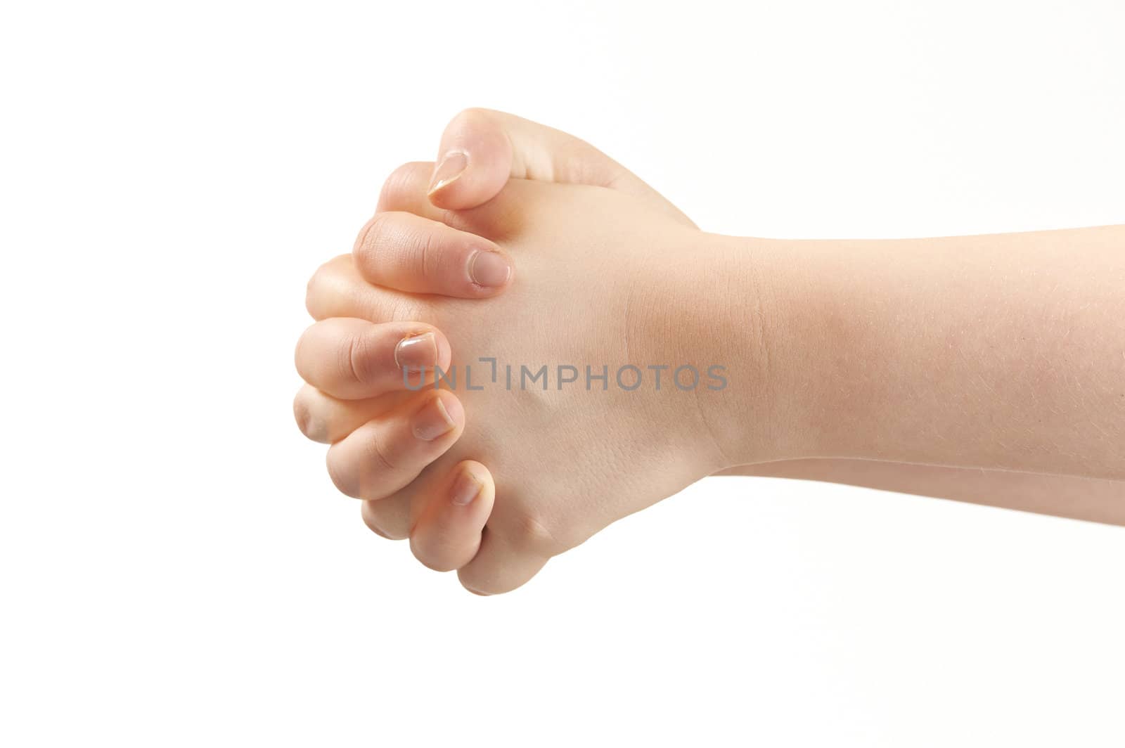 Folded hands of child - on white background