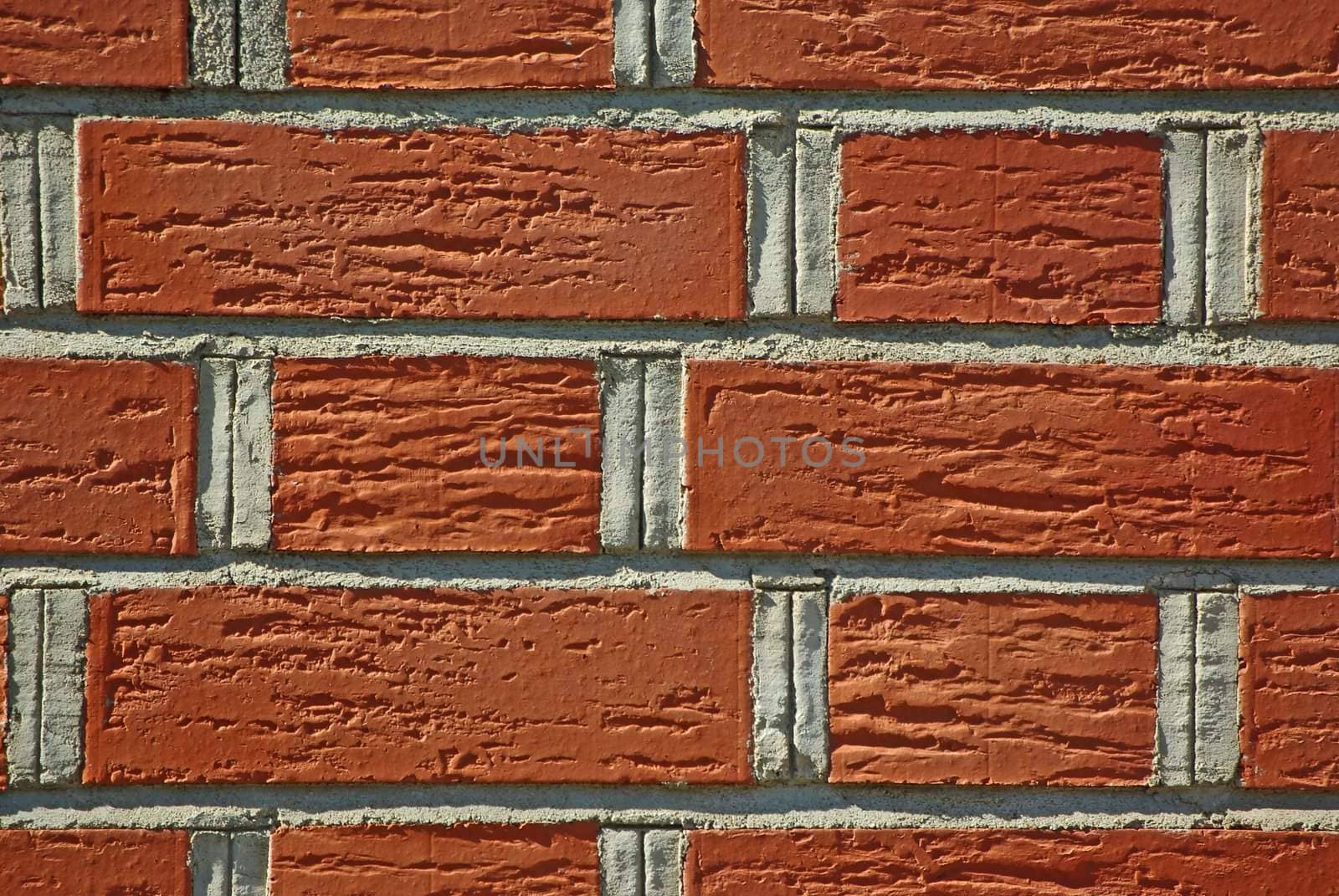 Adged brown brick wall of historical building