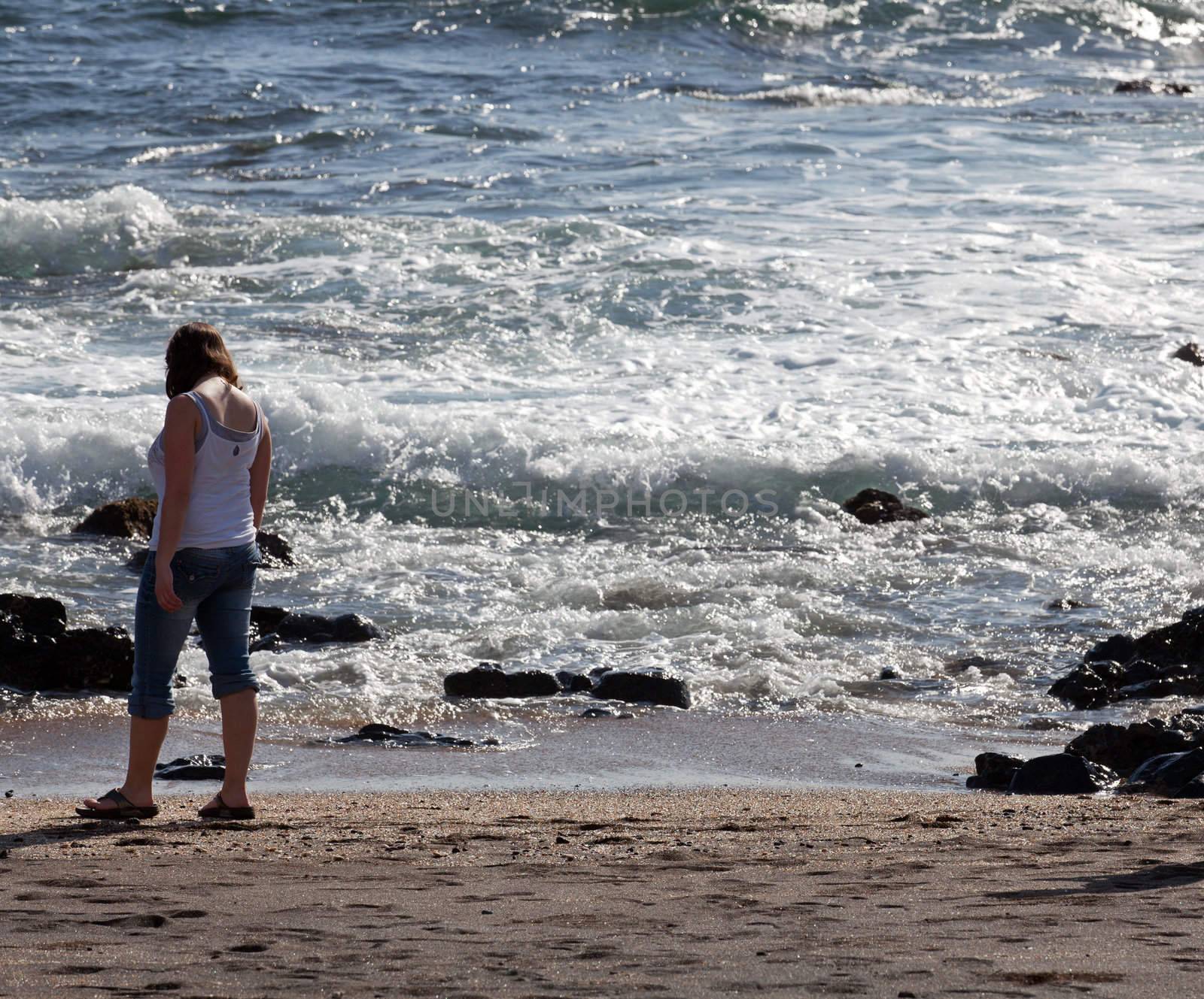 Woman beachcomb on Glass Beach by steheap