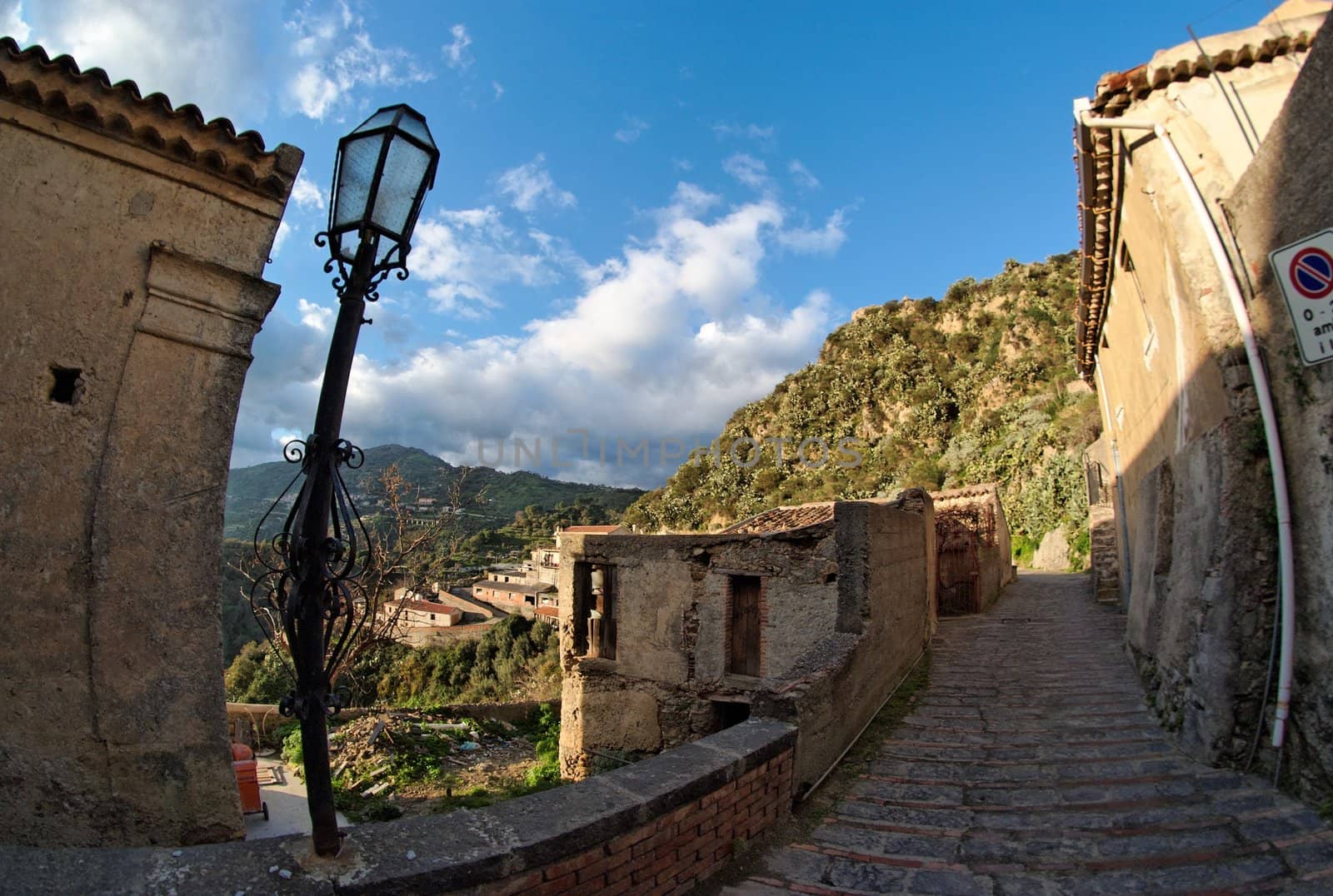Fisheye view of medieval village of Savoca in Sicily, Italy, at sunset