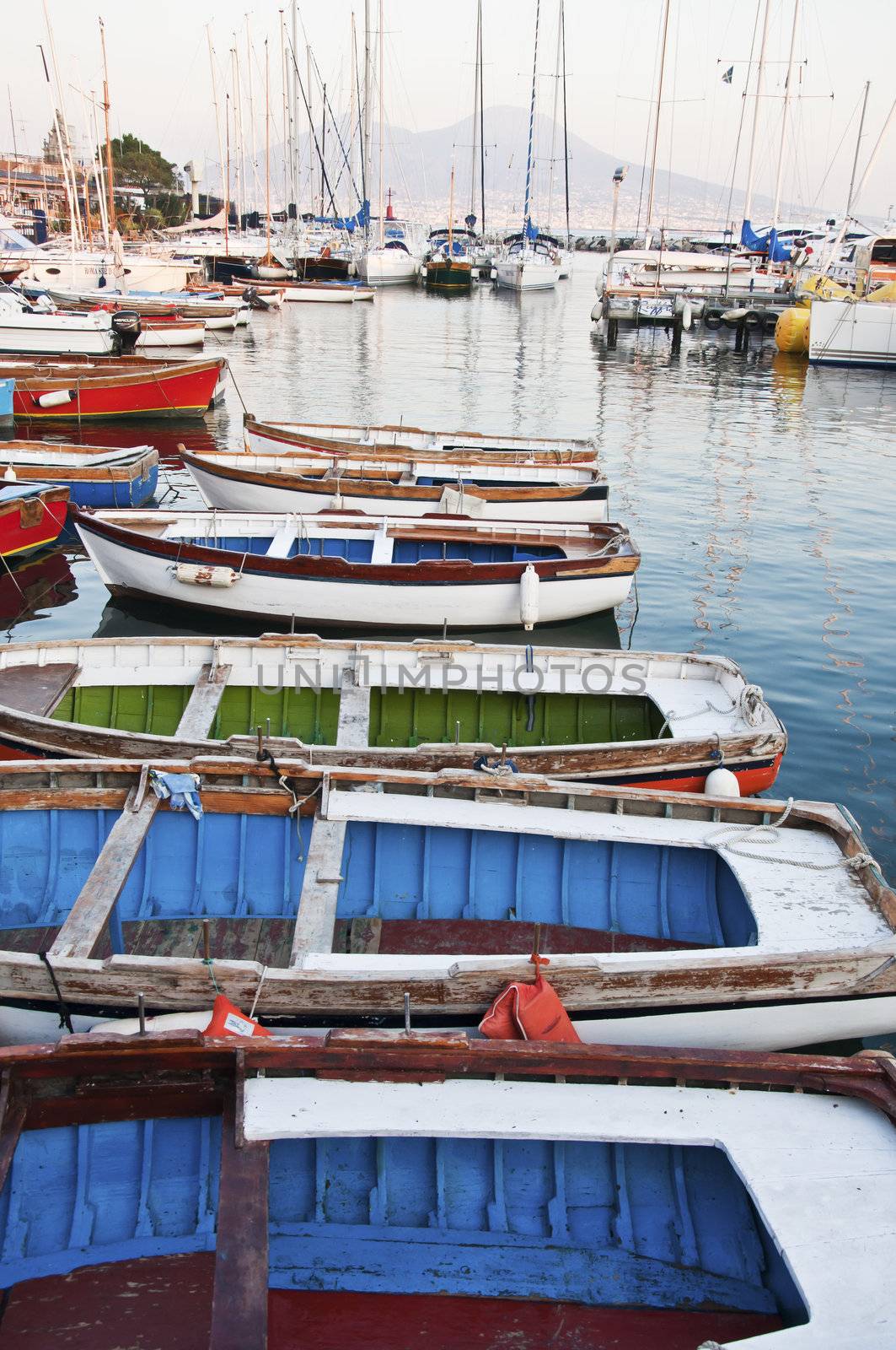 colored boats in the mediterranean sea