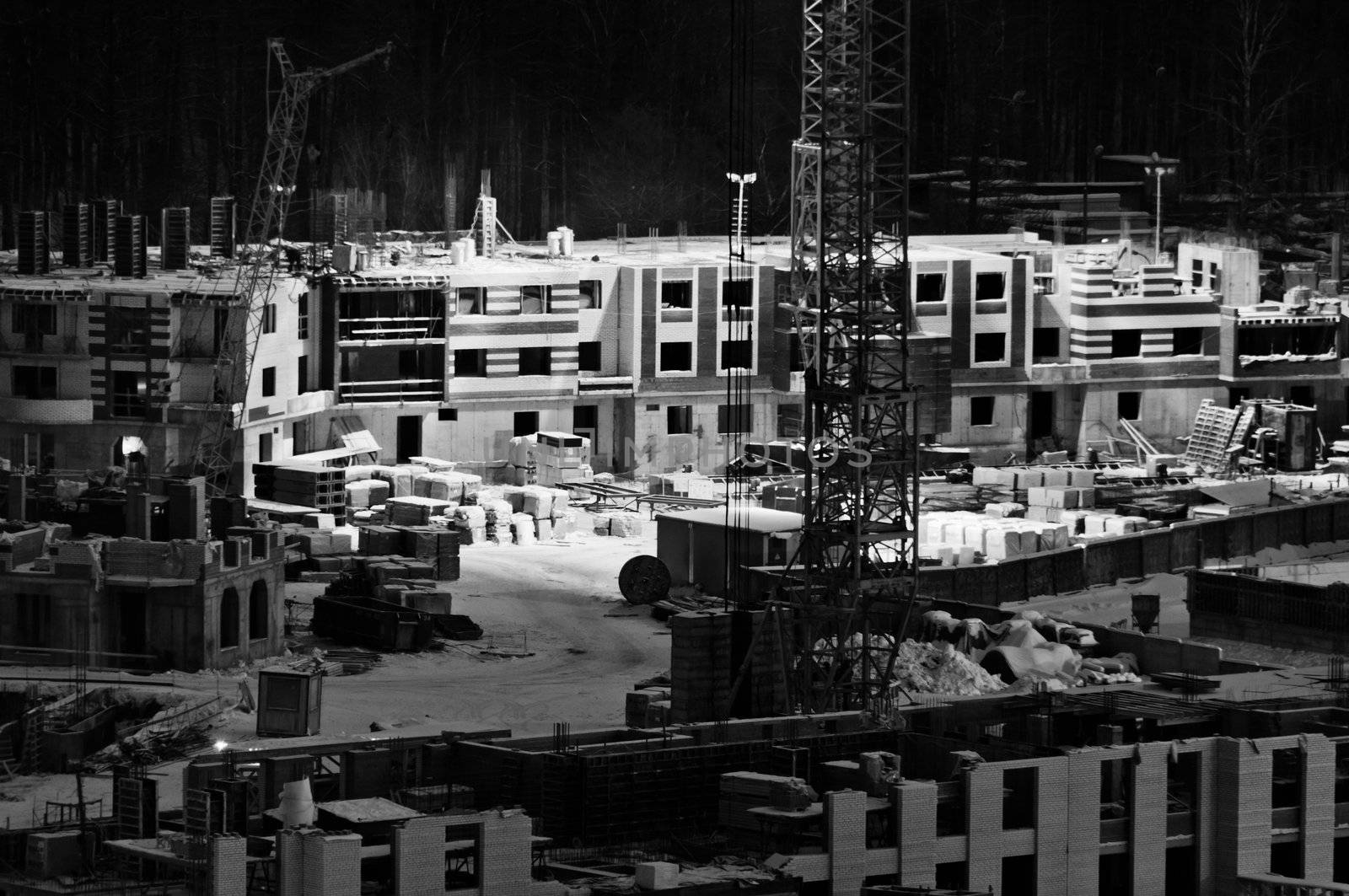 Empty contruction yard is like a miniature at twilight in balck and white