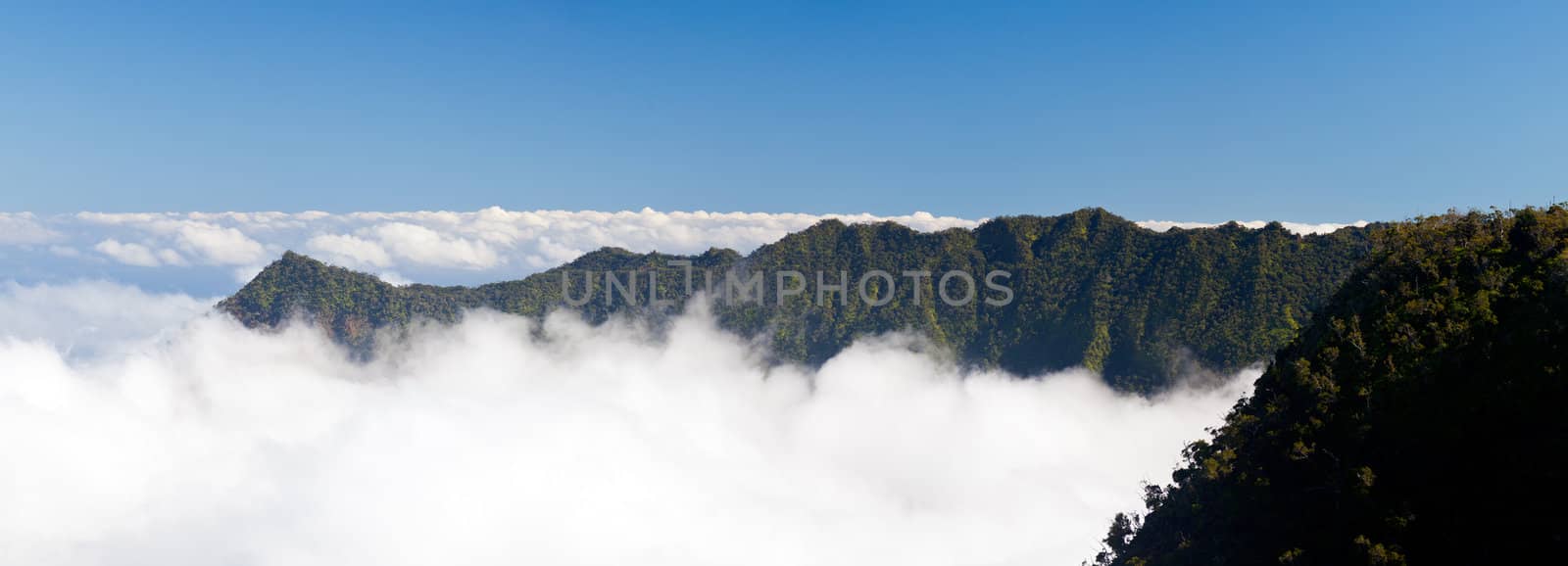 Panorama of clouds forming on Kalalau valley in Kauai Na Pali Coast