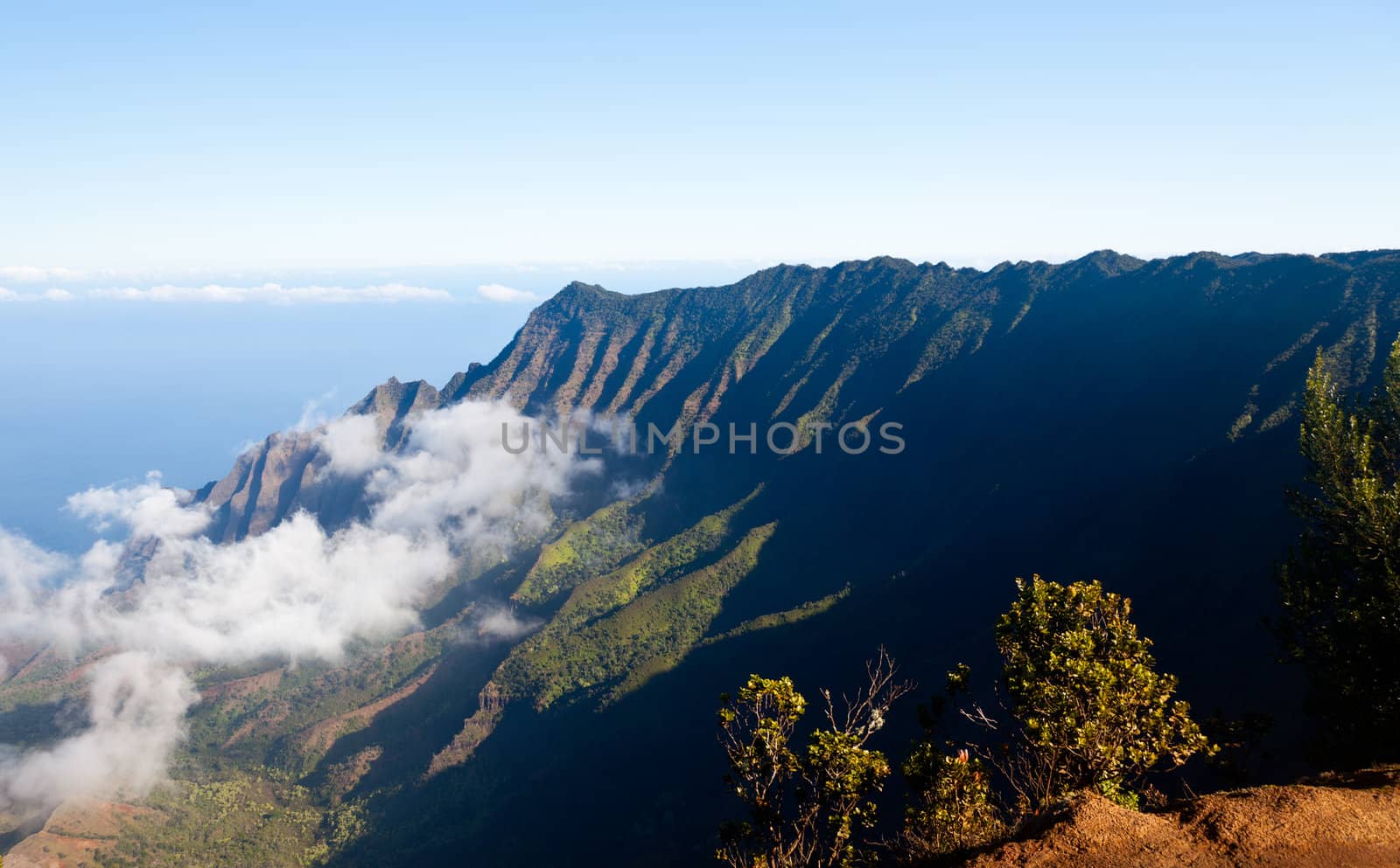 Low clouds start to form on Kalalau valley in Kauai Na Pali Coast