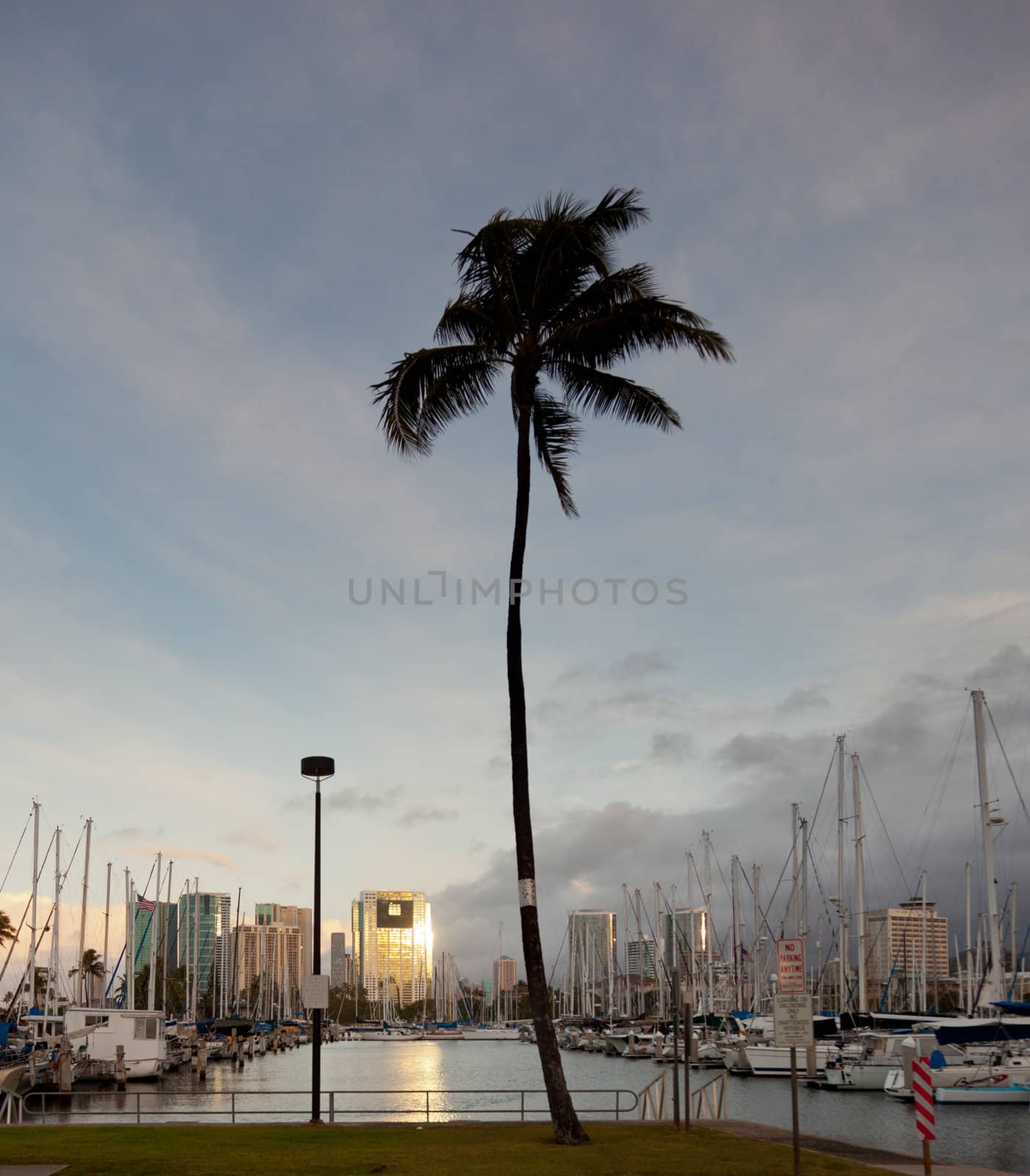 HONOLULU, HI - JANUARY 15: Reflections from downtown Honolulu and Hawaiki Tower on January 15, 2012. Hawaiki Tower has 46 stories and rises 400 feet.