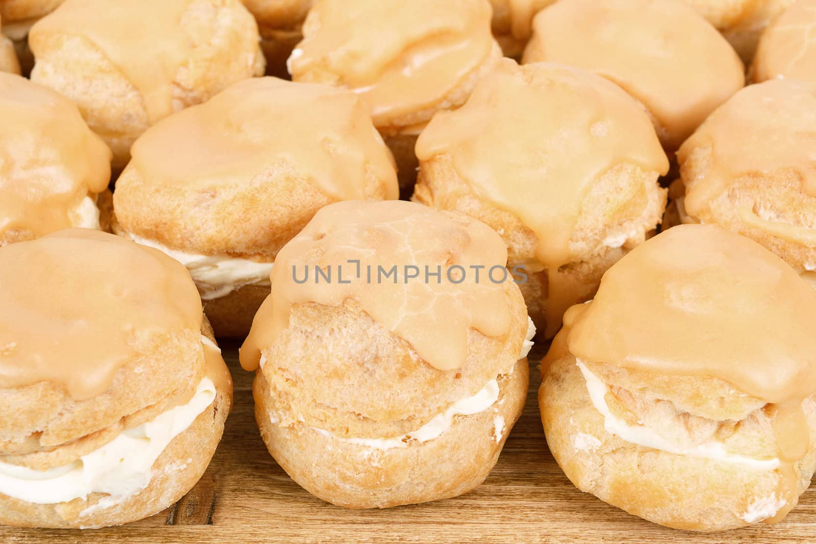homemade very sweet candy cakes on wooden background