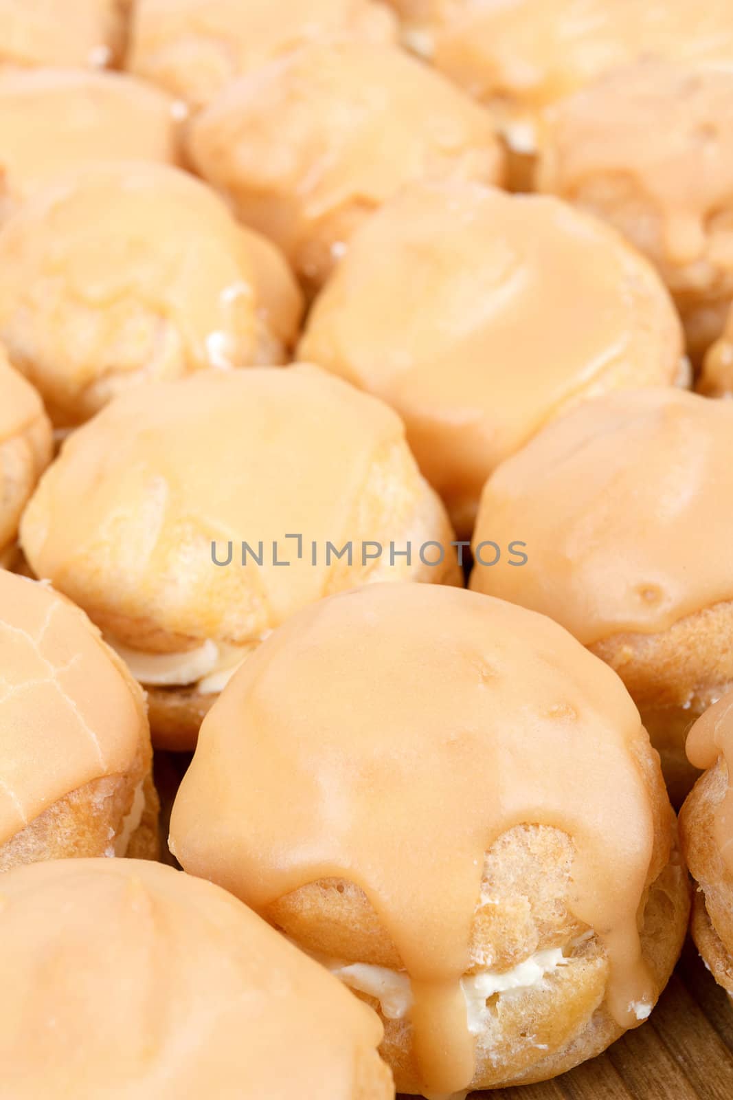homemade very sweet candy cakes on wooden background