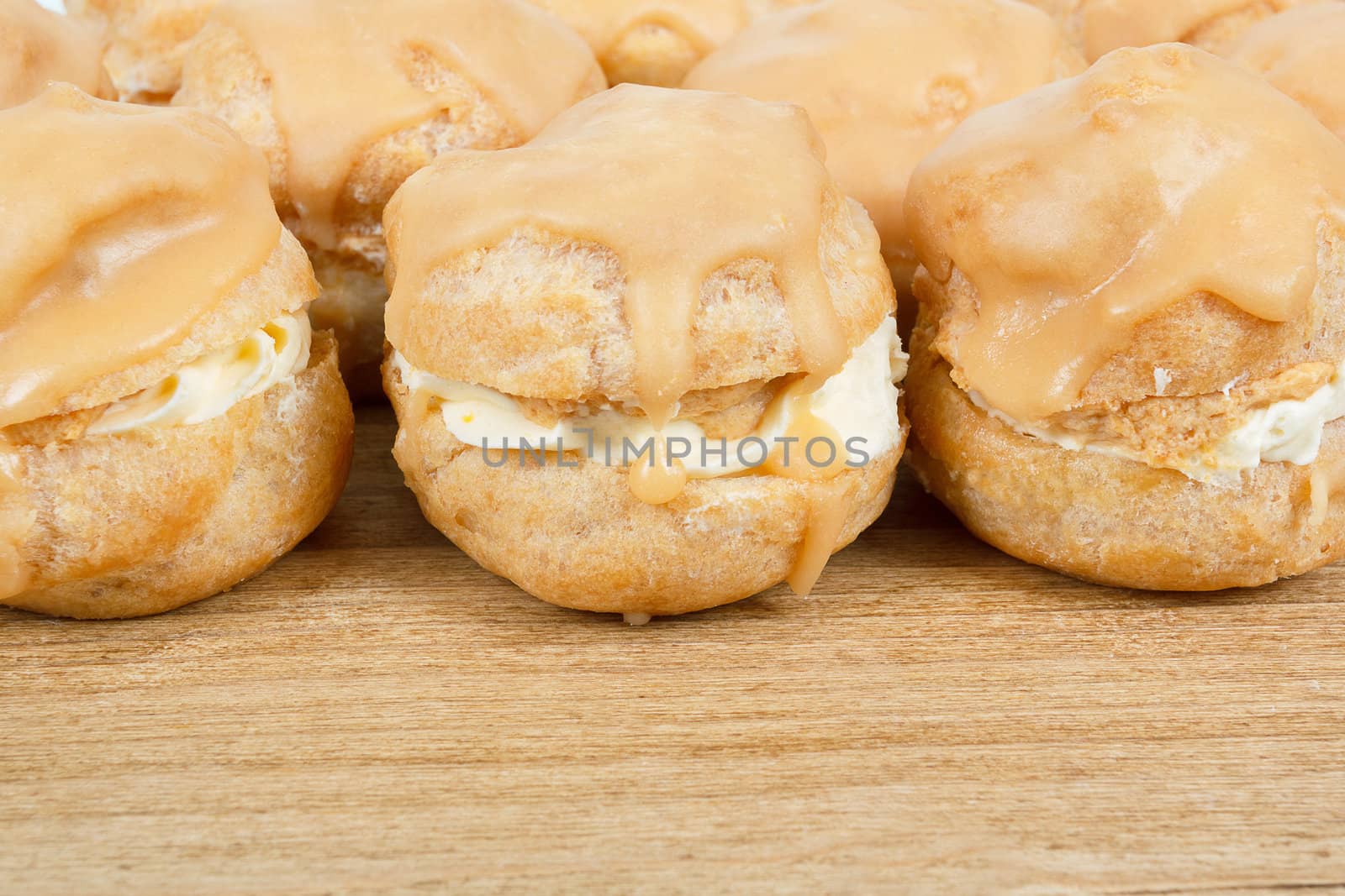 homemade very sweet candy cakes on wooden background