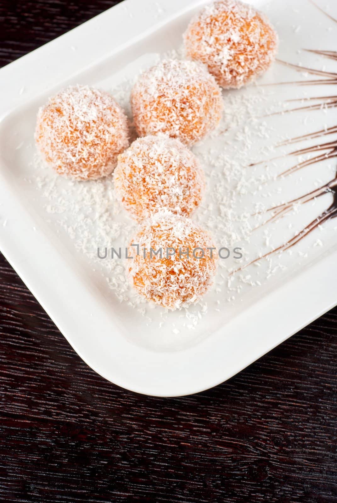 fresh baked cupcake closeup on a white plate