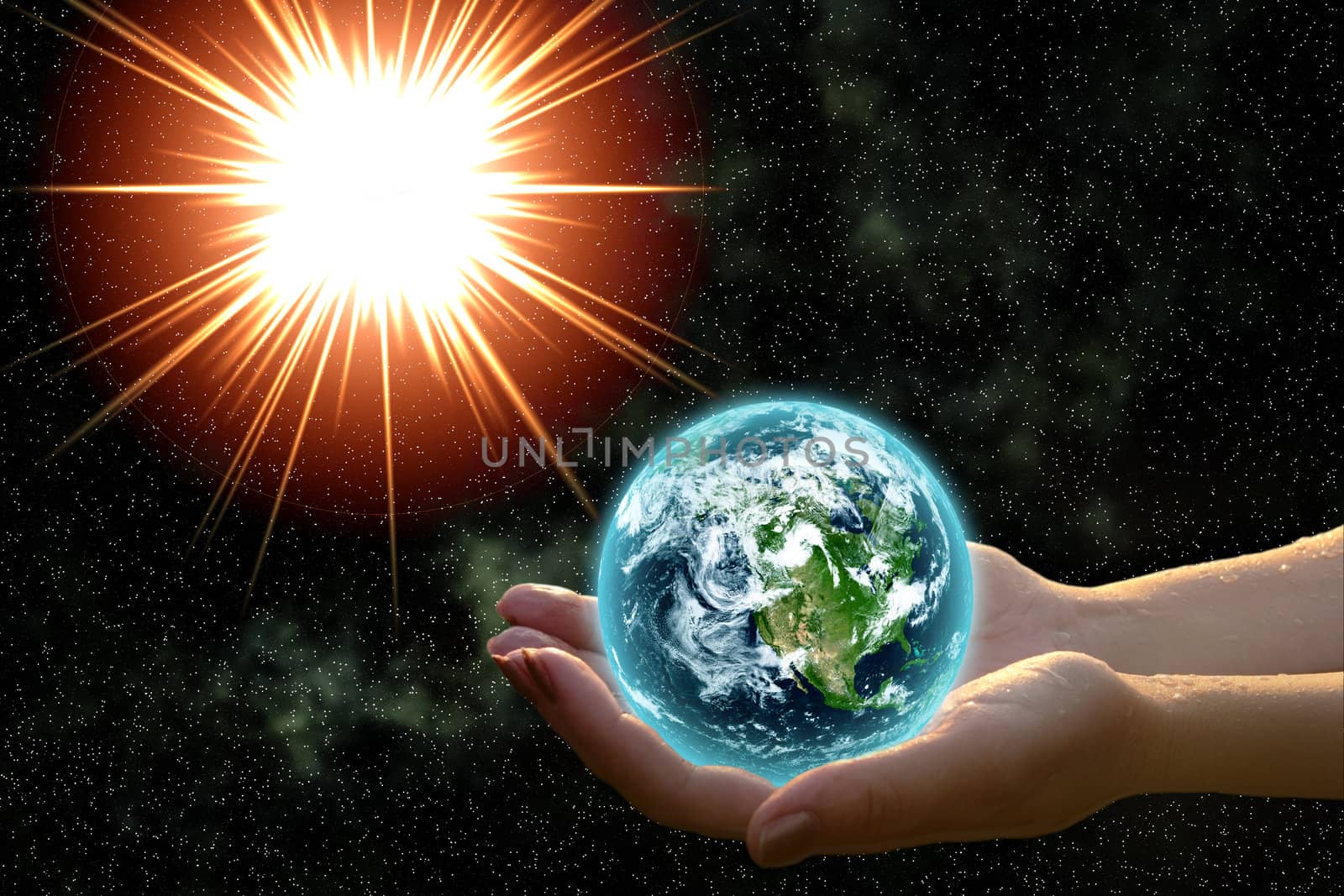 earth in woman hands against open cosmos space