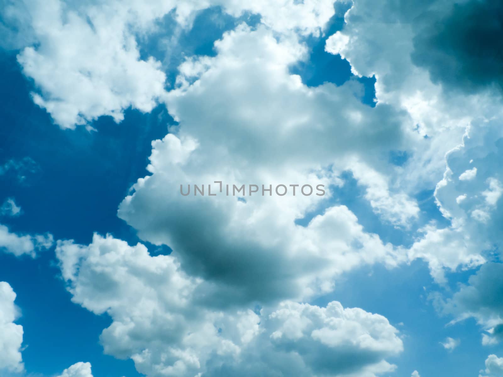 dramatic blue sky with clouds, for backgrounds.