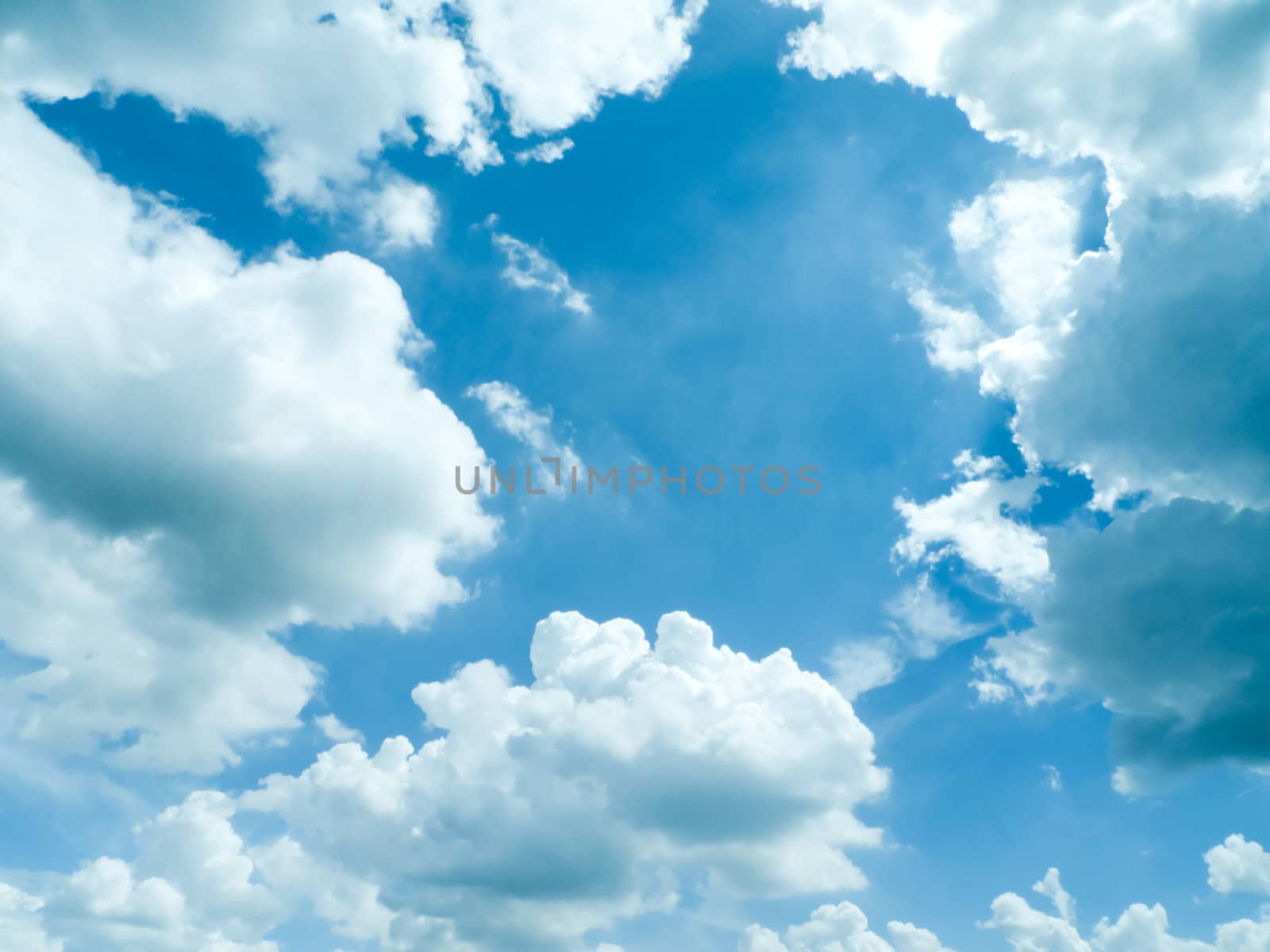 dramatic blue sky with clouds, for backgrounds.