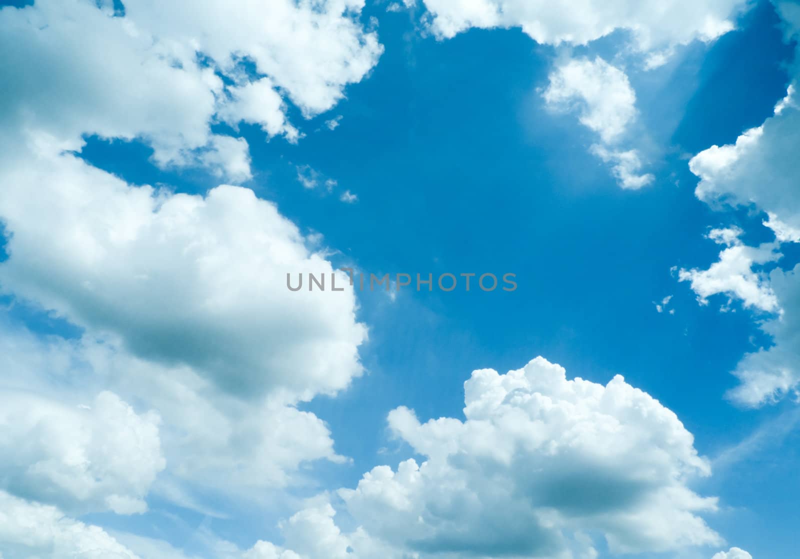 dramatic blue sky with clouds, for backgrounds.