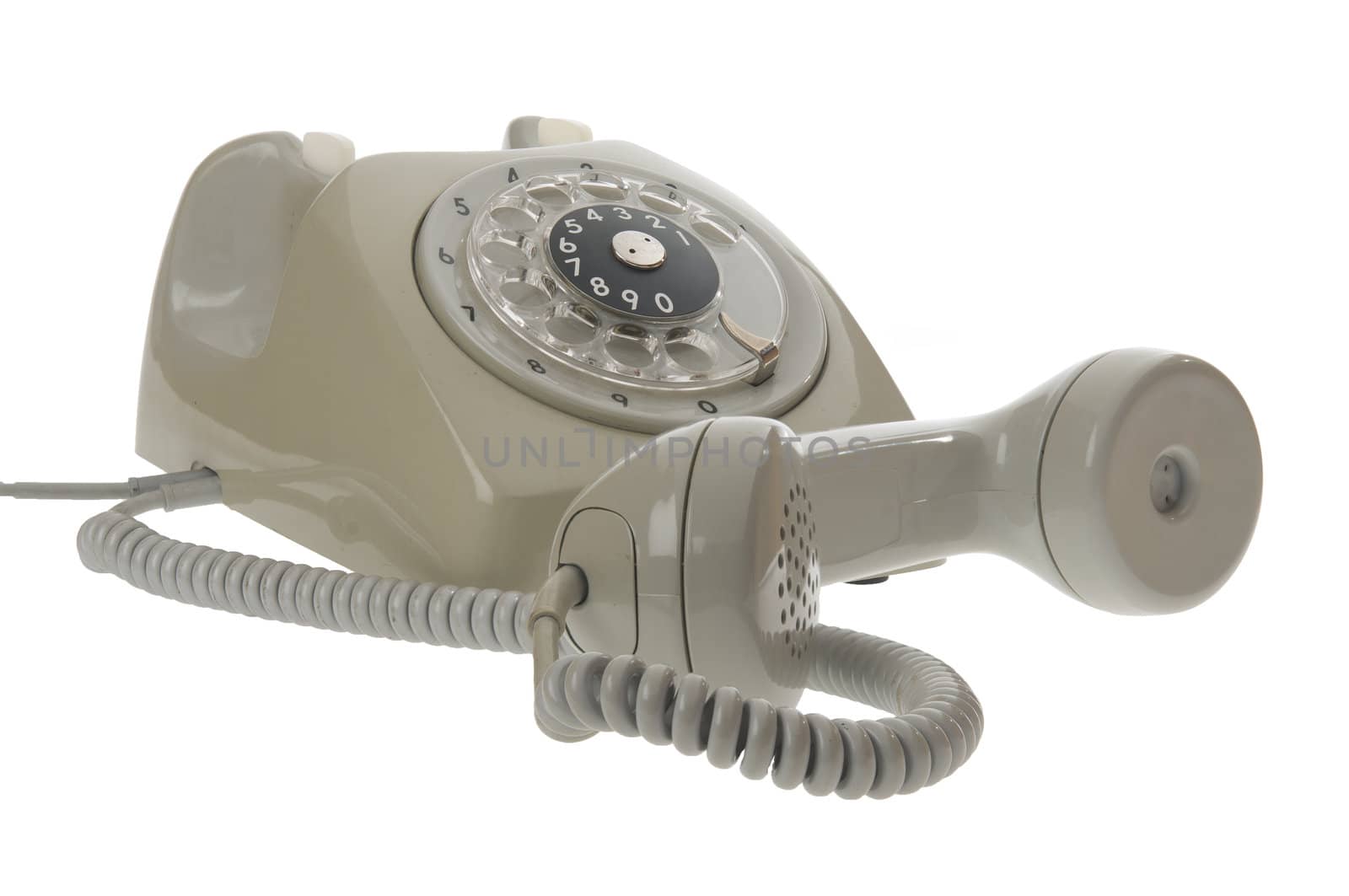 Old vintage rotary style telephone - handset off by jogvan