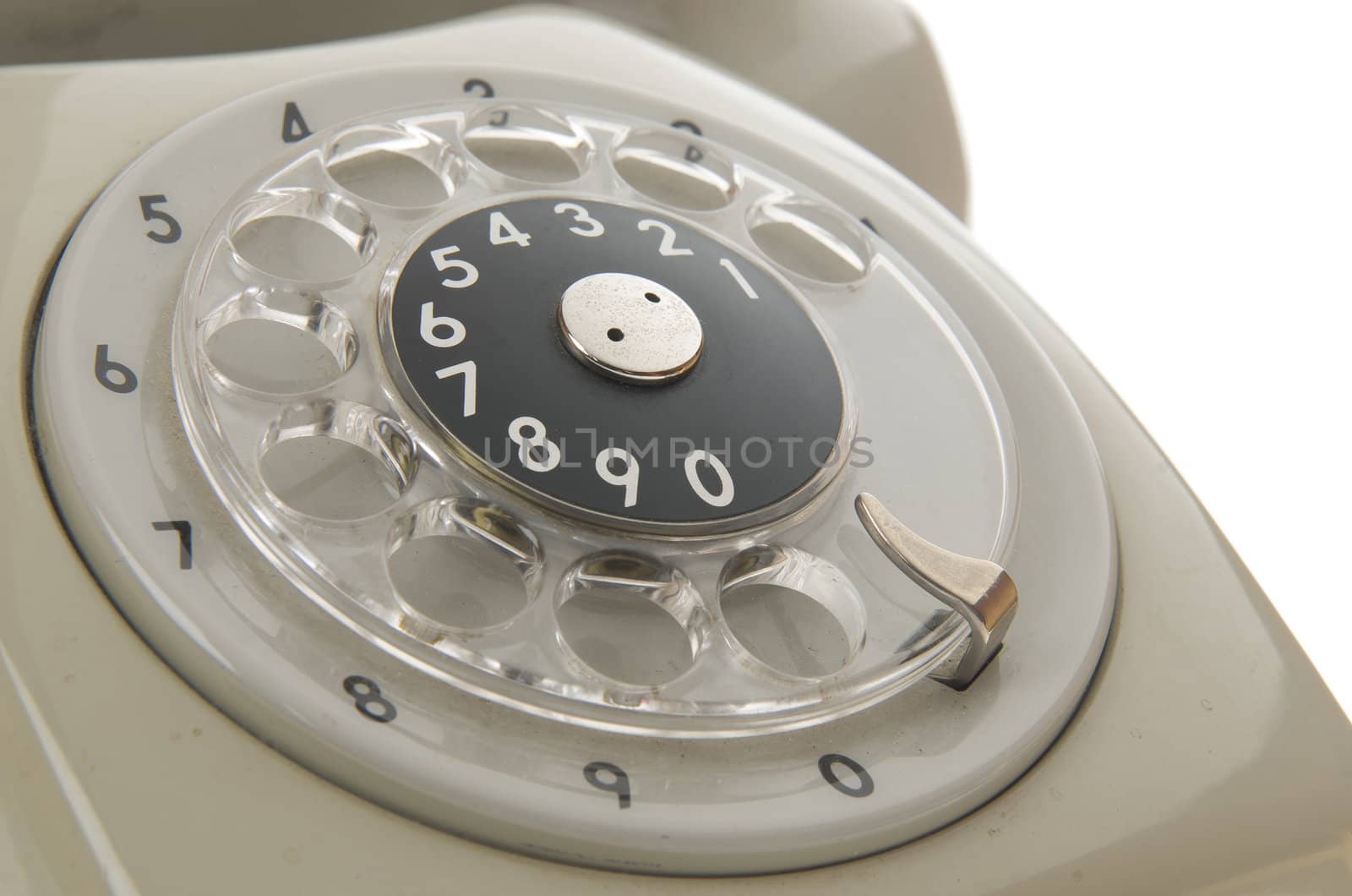 Rotary dial of an old phone by jogvan