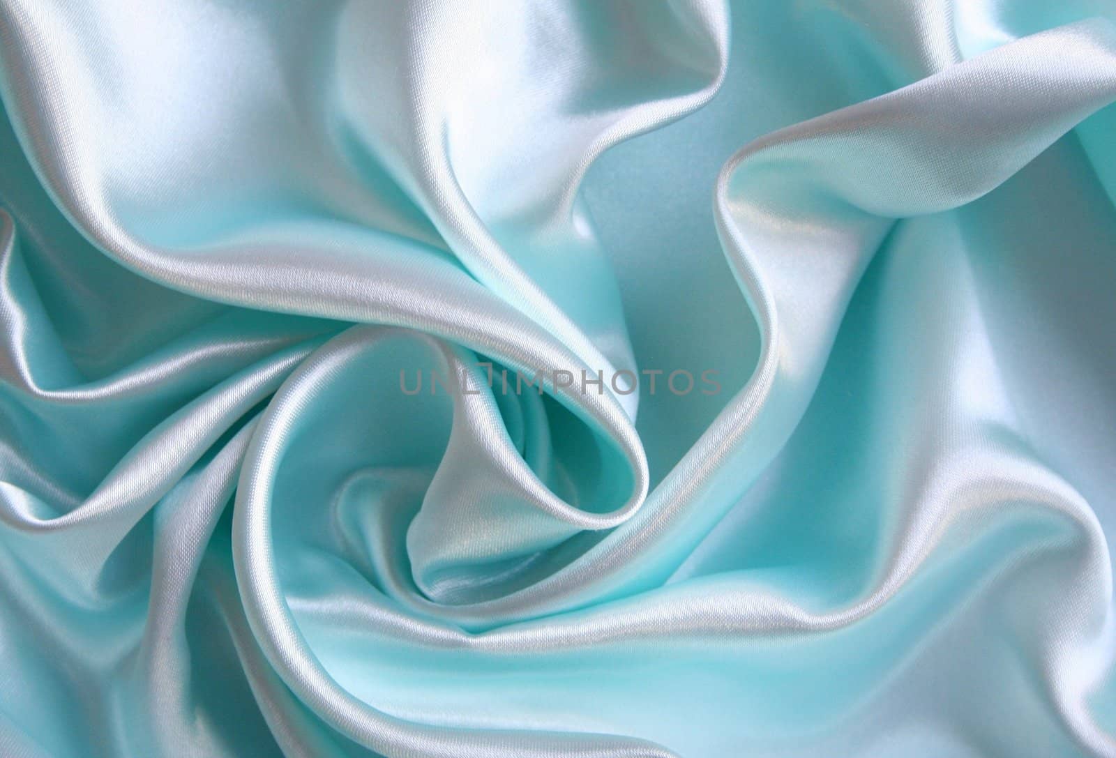 Smooth elegant blue silk as background 
