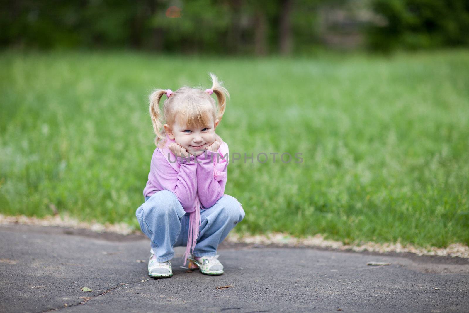 small girl outdoors in spring