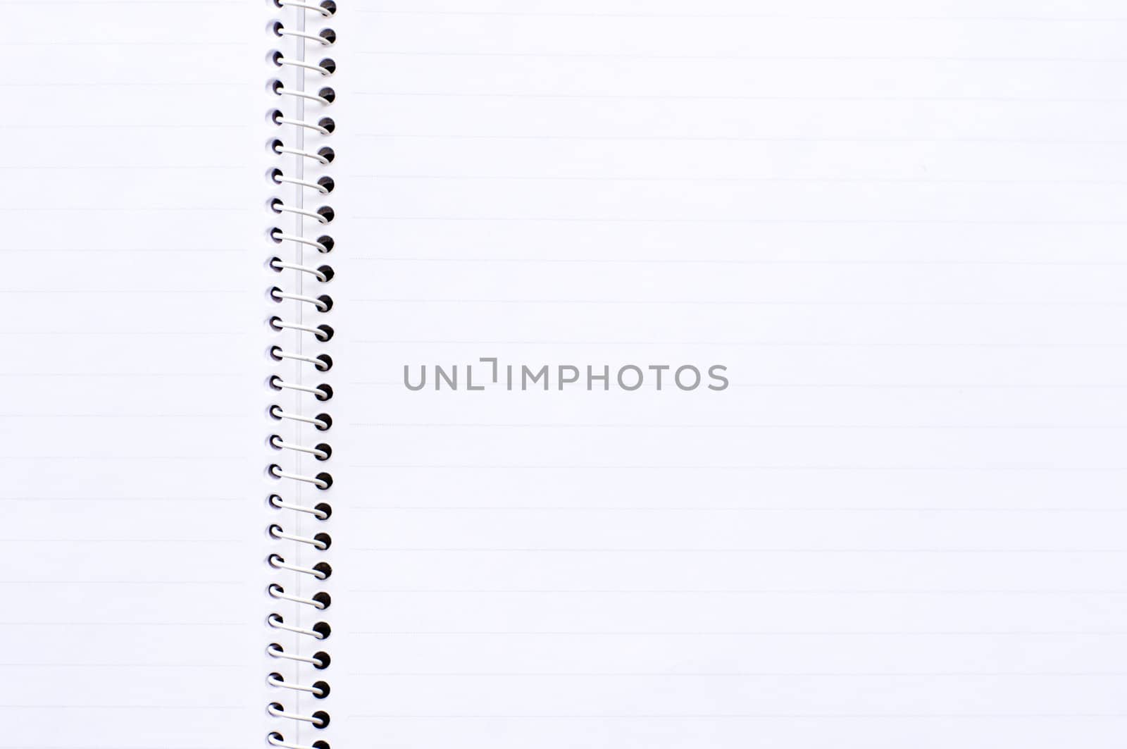 notebook page with binding ring, for image manipulation.