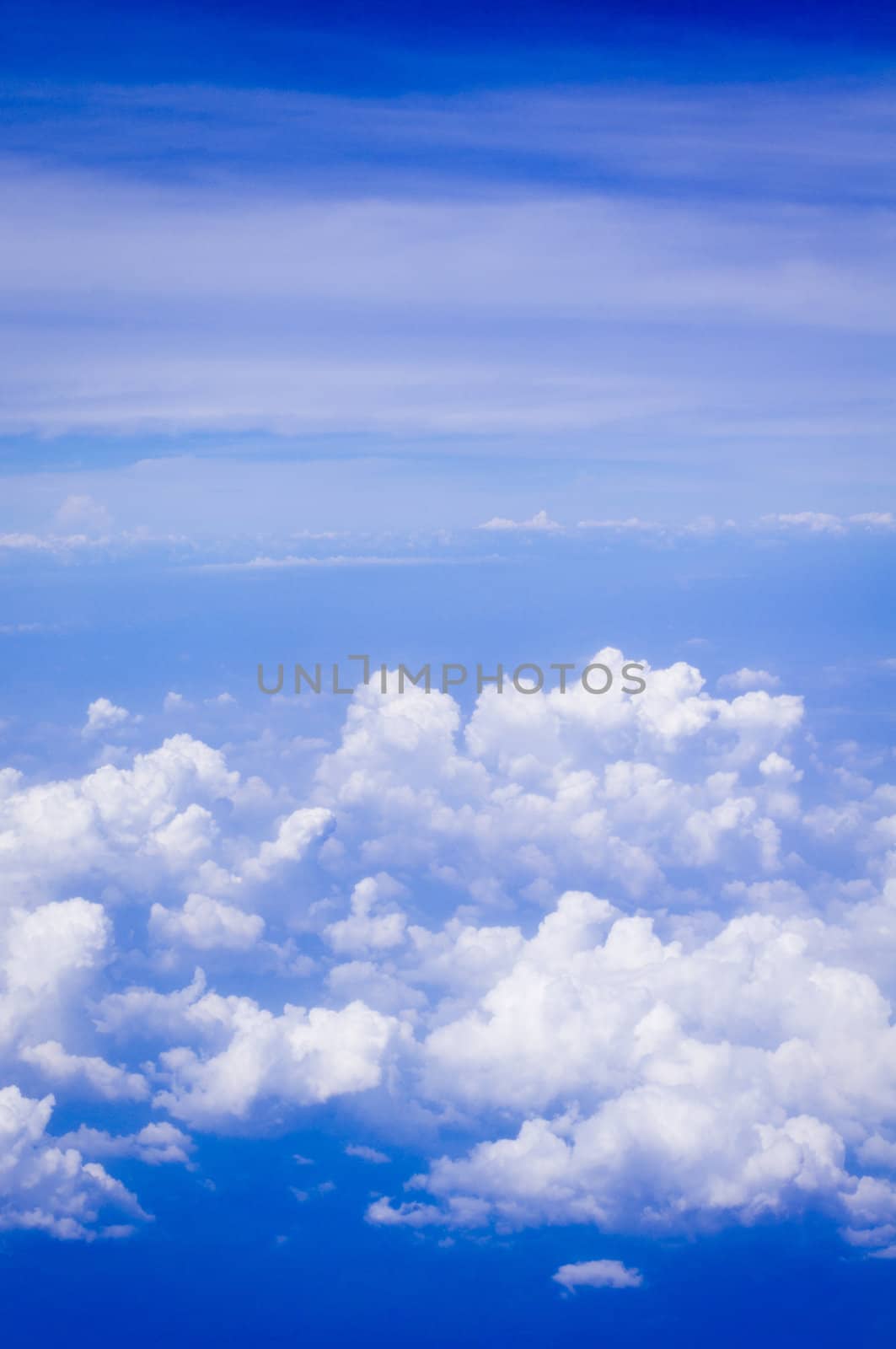 a view of sky, above of clouds.