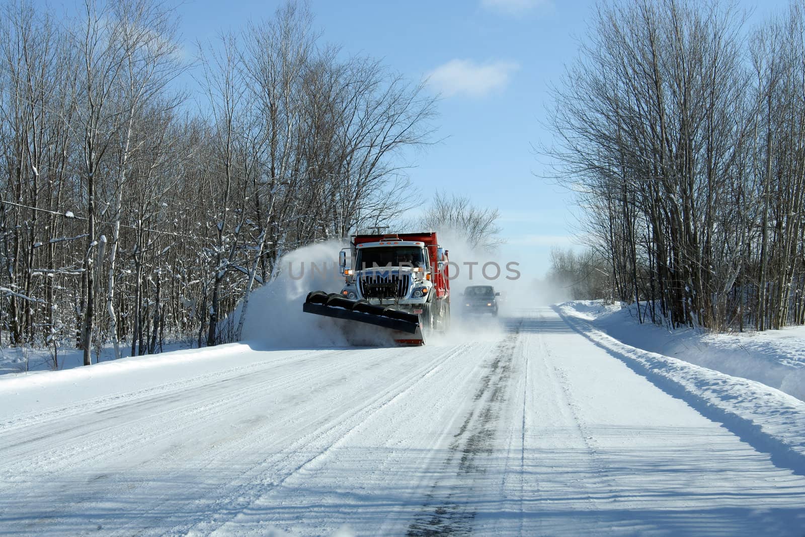 snowplow in action after a snowstorm