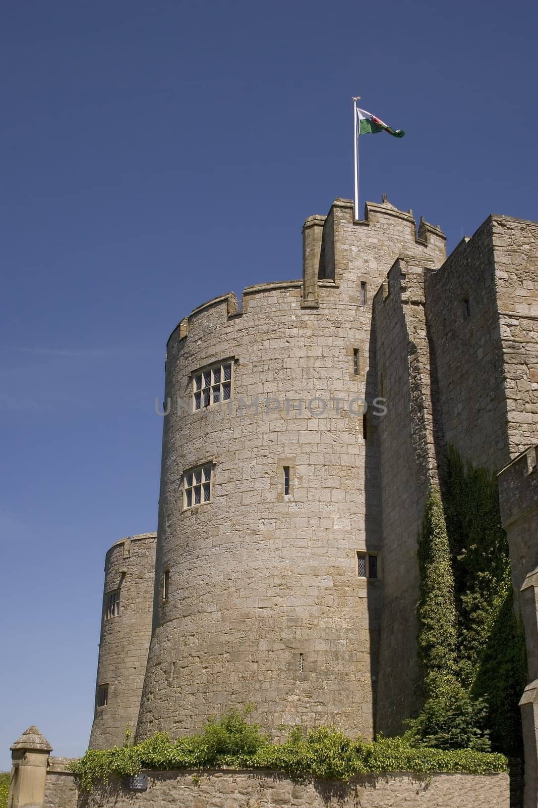 A turret on a castle with a flag flying