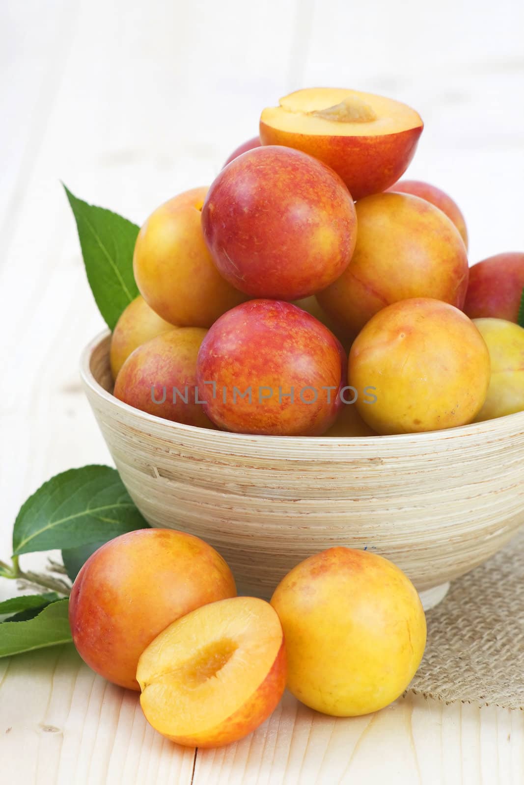 fresh plums in a bowl