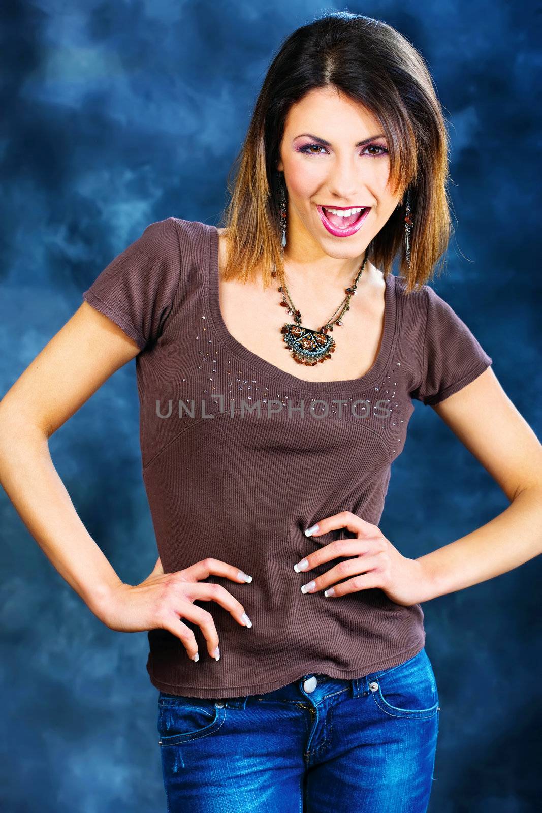 attractive young woman on dark background