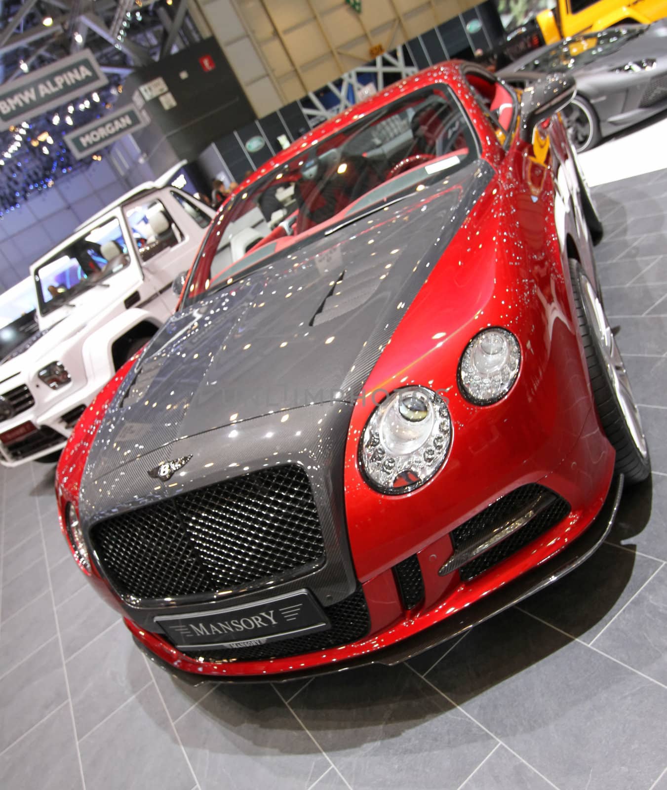 GENEVA - MARCH 8 : red and black Bentley Continental Mansory Sanguis on display at the 83st International Motor Show Palexpo - Geneva on March 8, 2013 in Geneva, Switzerland.