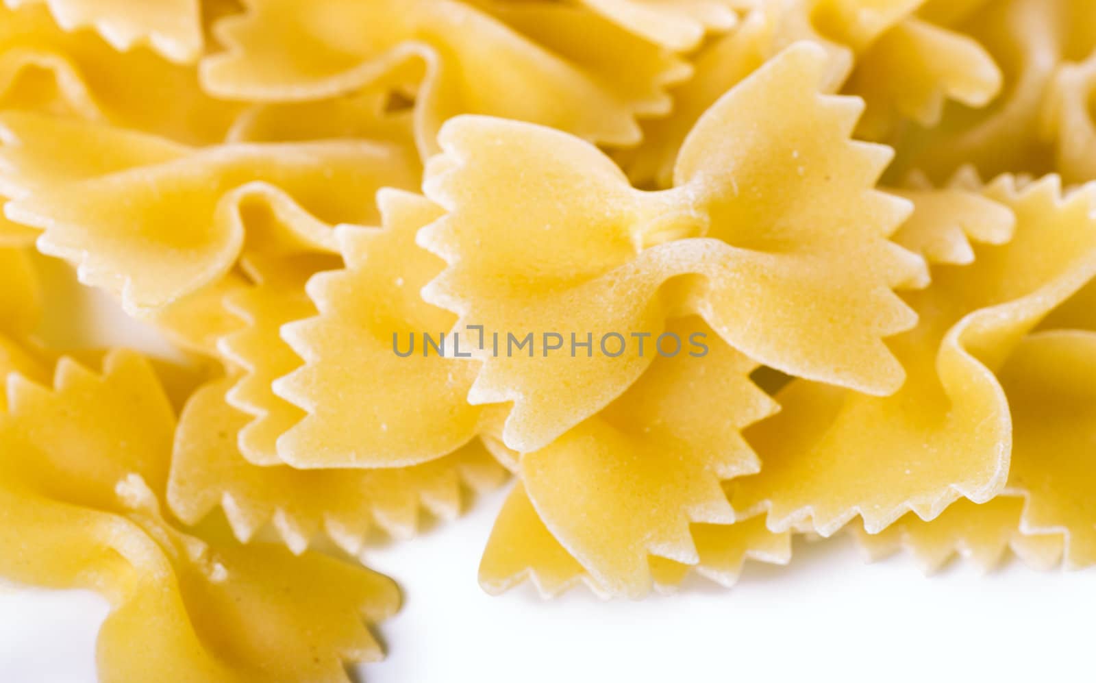 Closeup view of dried bow shaped macaroni