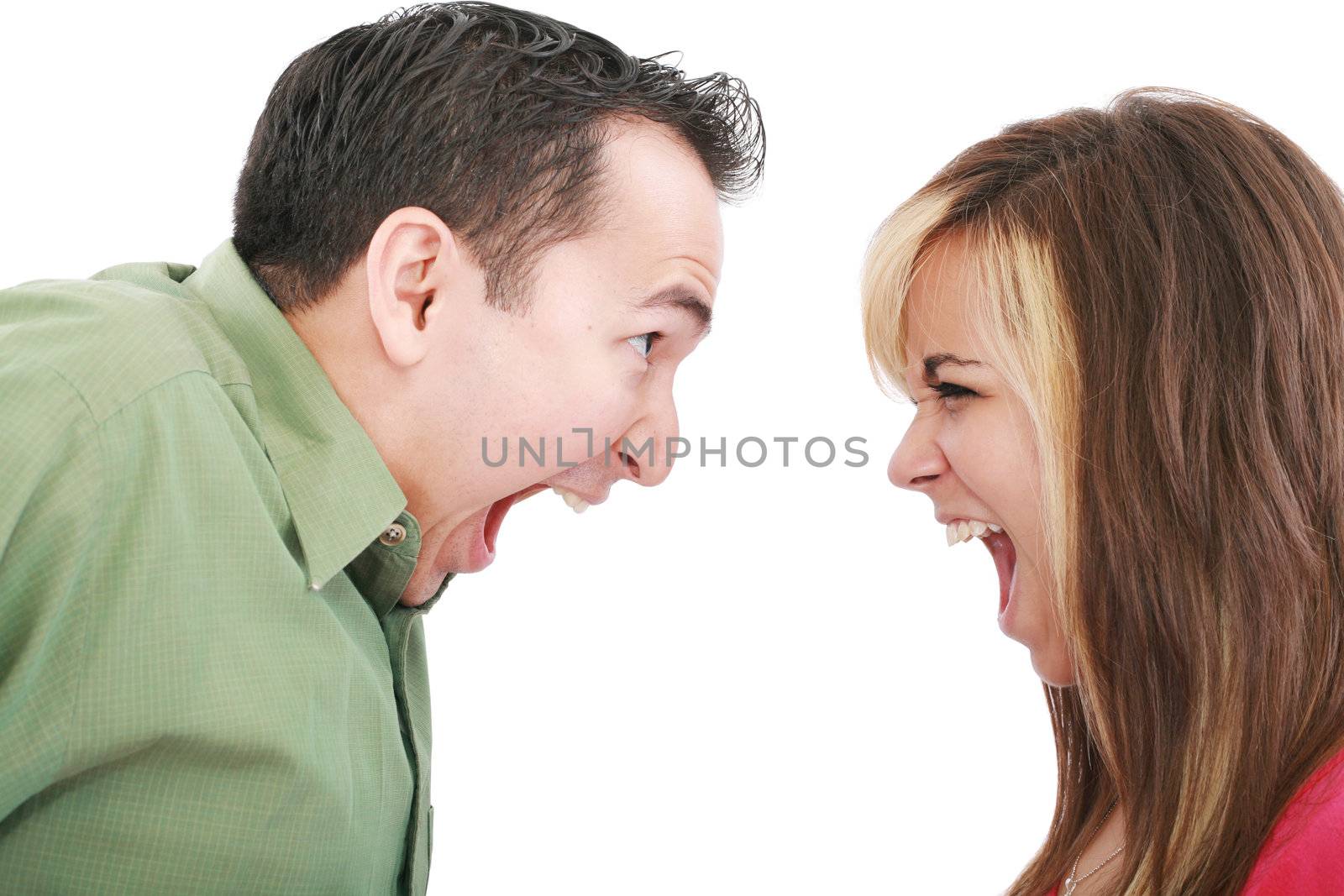 Portrait of a man and woman yelling at each other against white background