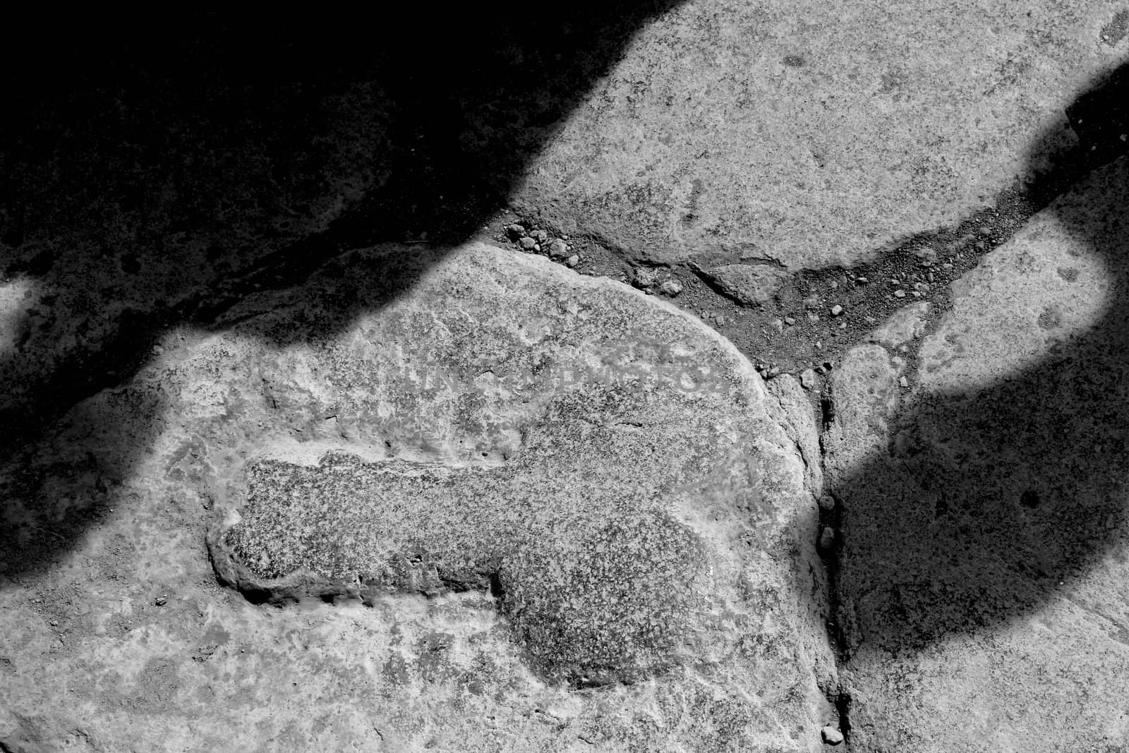 Penis in Pompeii, sign of prosperity knocked out in a stone