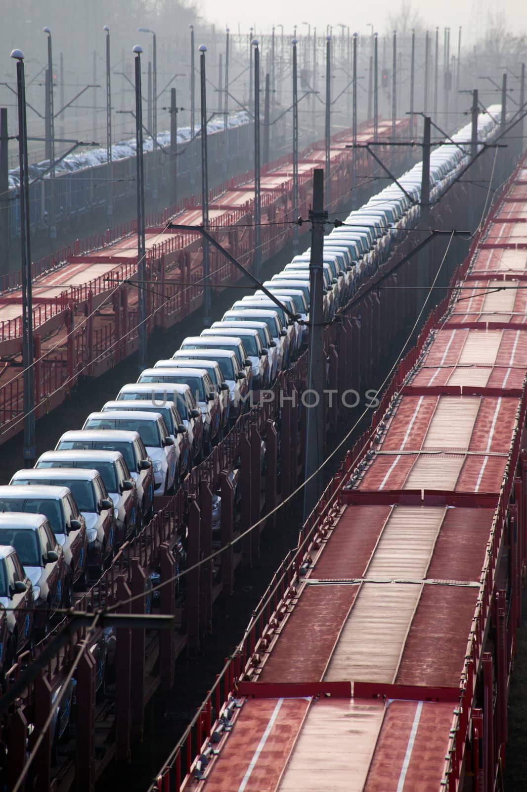 Freight trains with different cargo on the station
