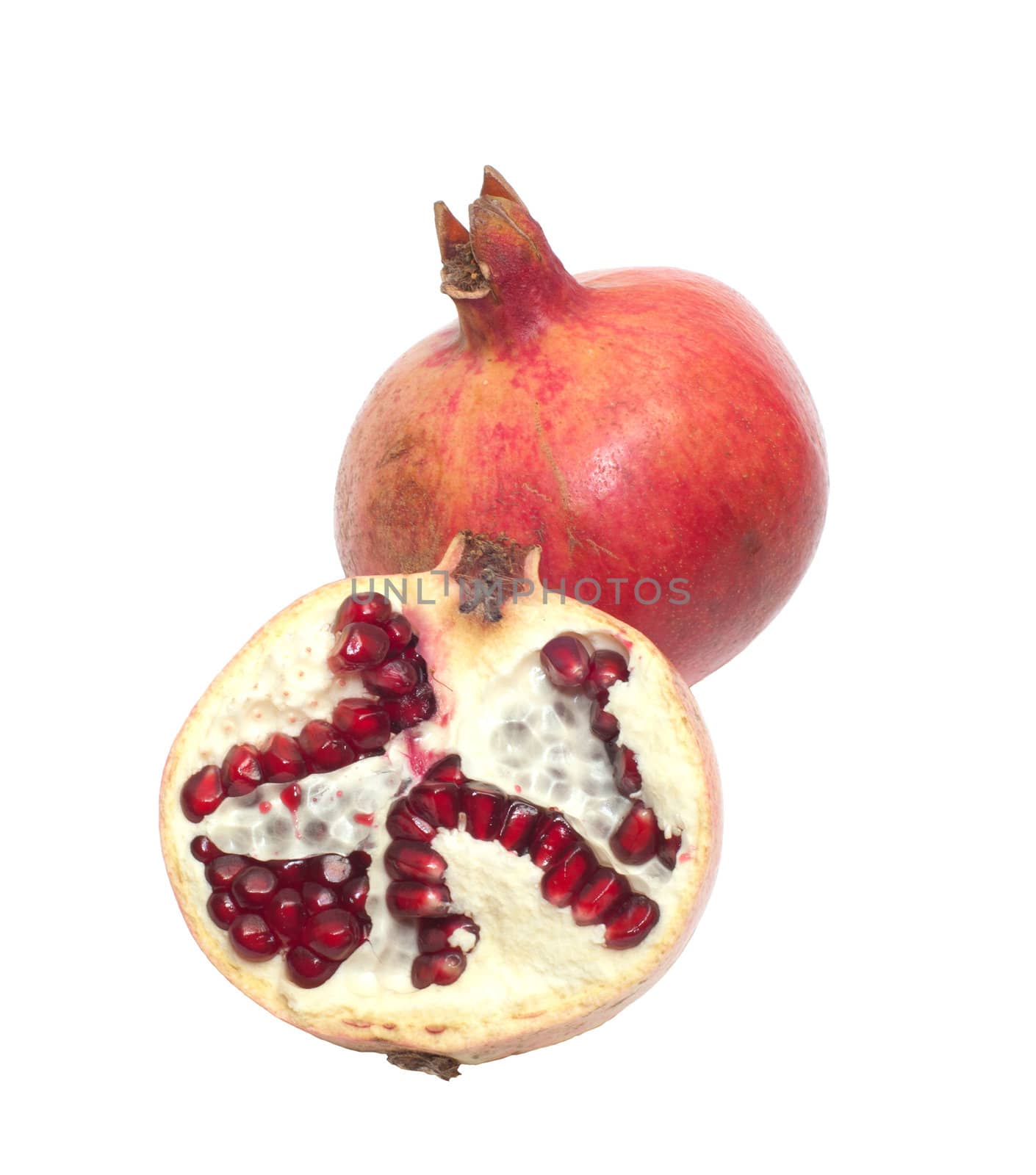Ripe pomegranate it is isolated on a white background.