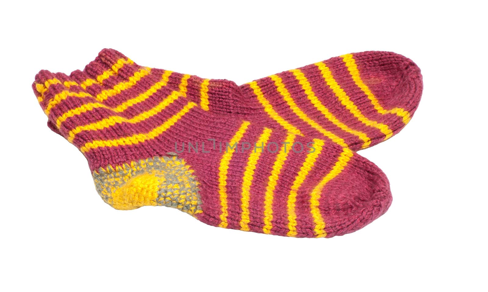 Pair of knitted woolen socks it is isolated on a white background.