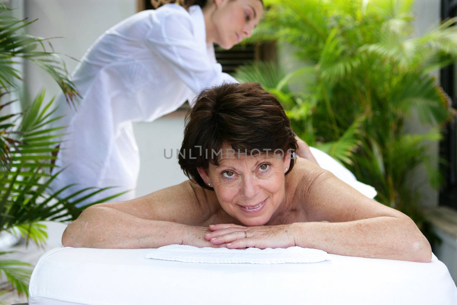 Mature woman having a massage by phovoir