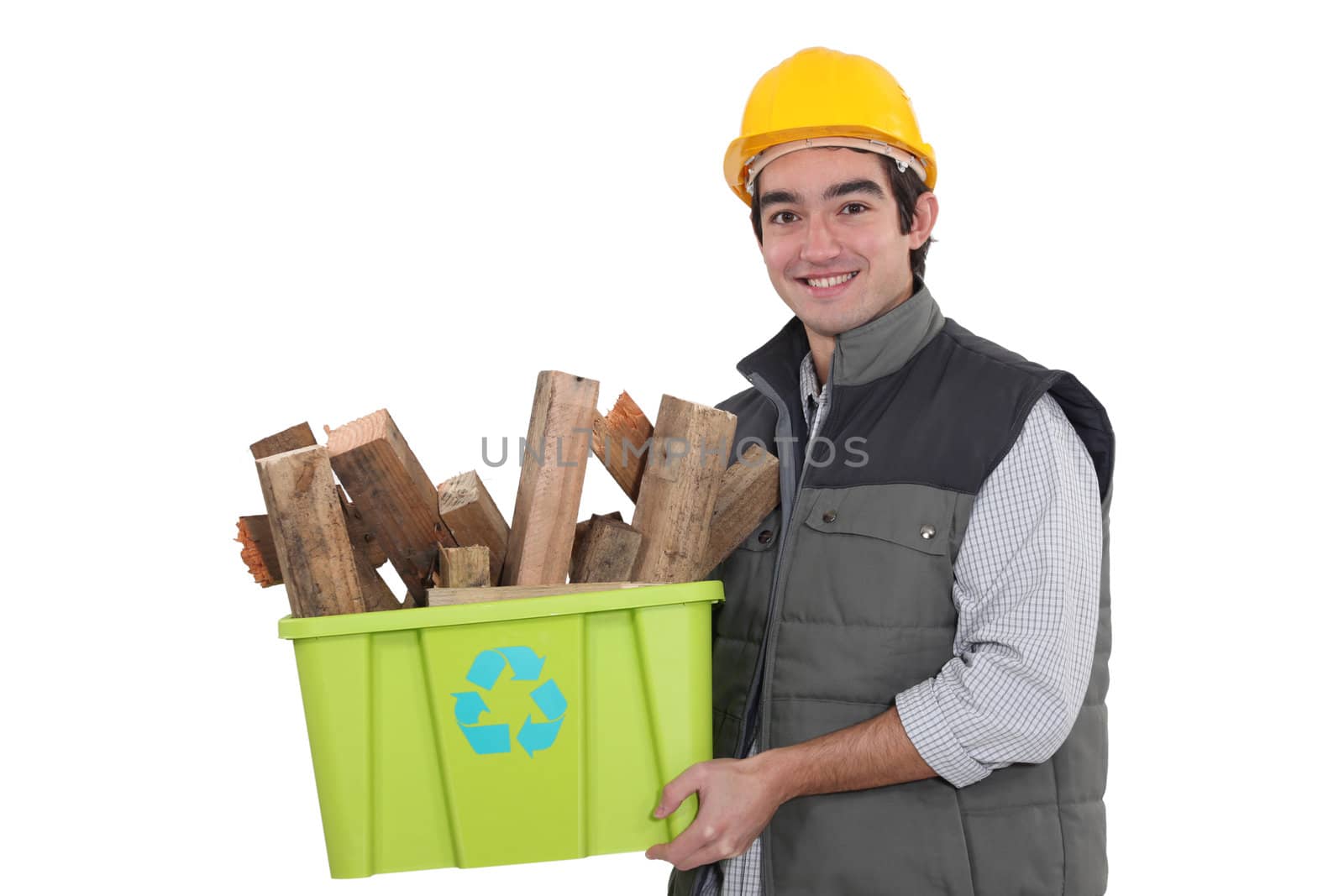 craftsman holding a box with recycling materials by phovoir