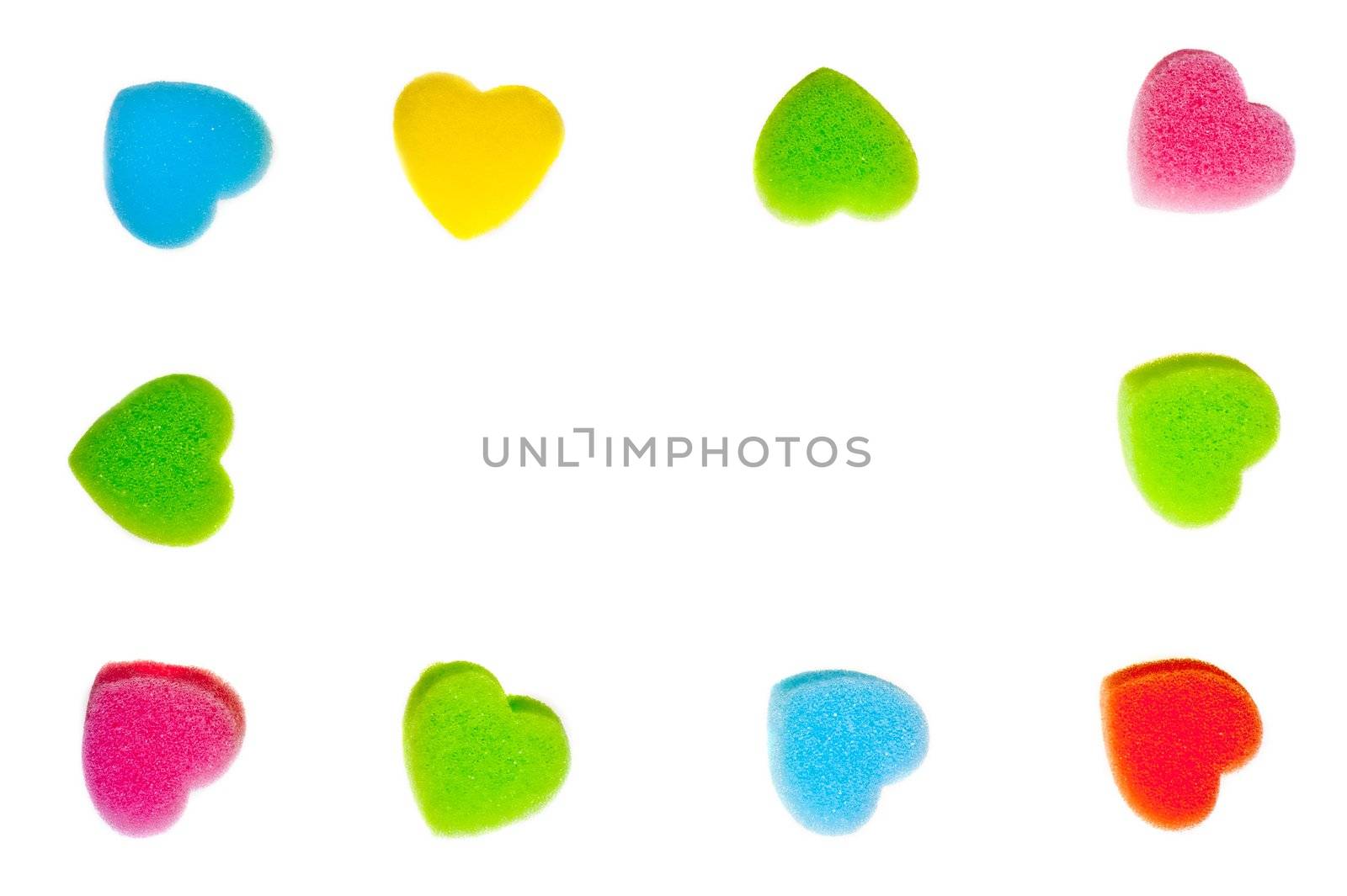 Frame of colorful hearts on a white background