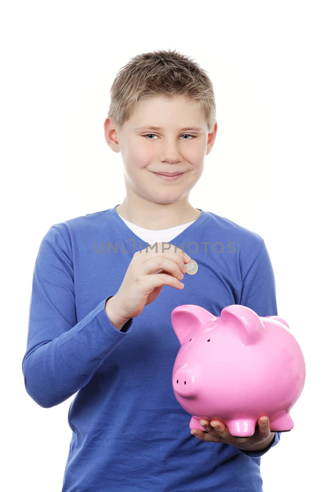 boy saving money in a piggybank