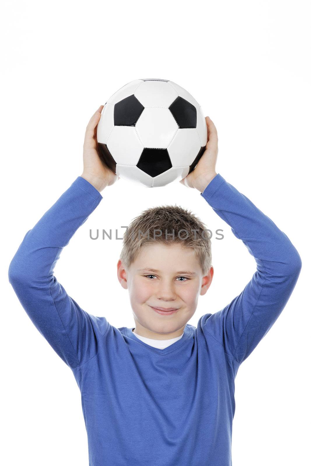 Cute boy holding a football ball