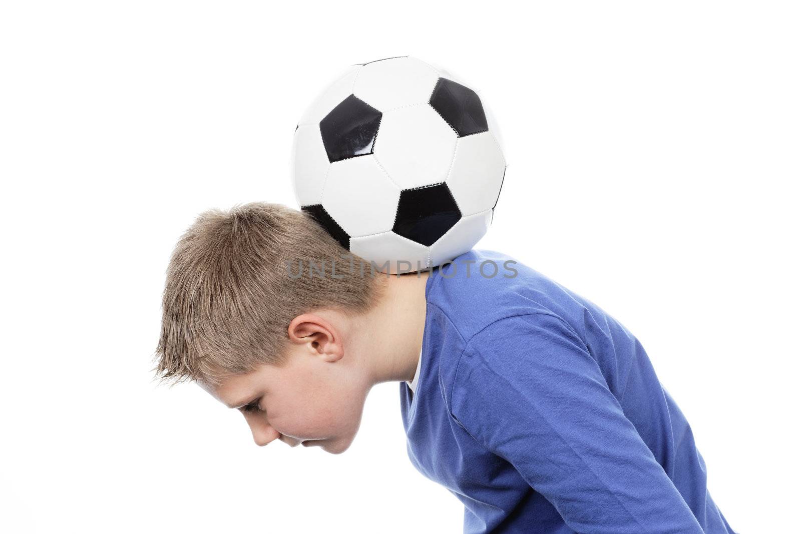 Cute boy with a football ball