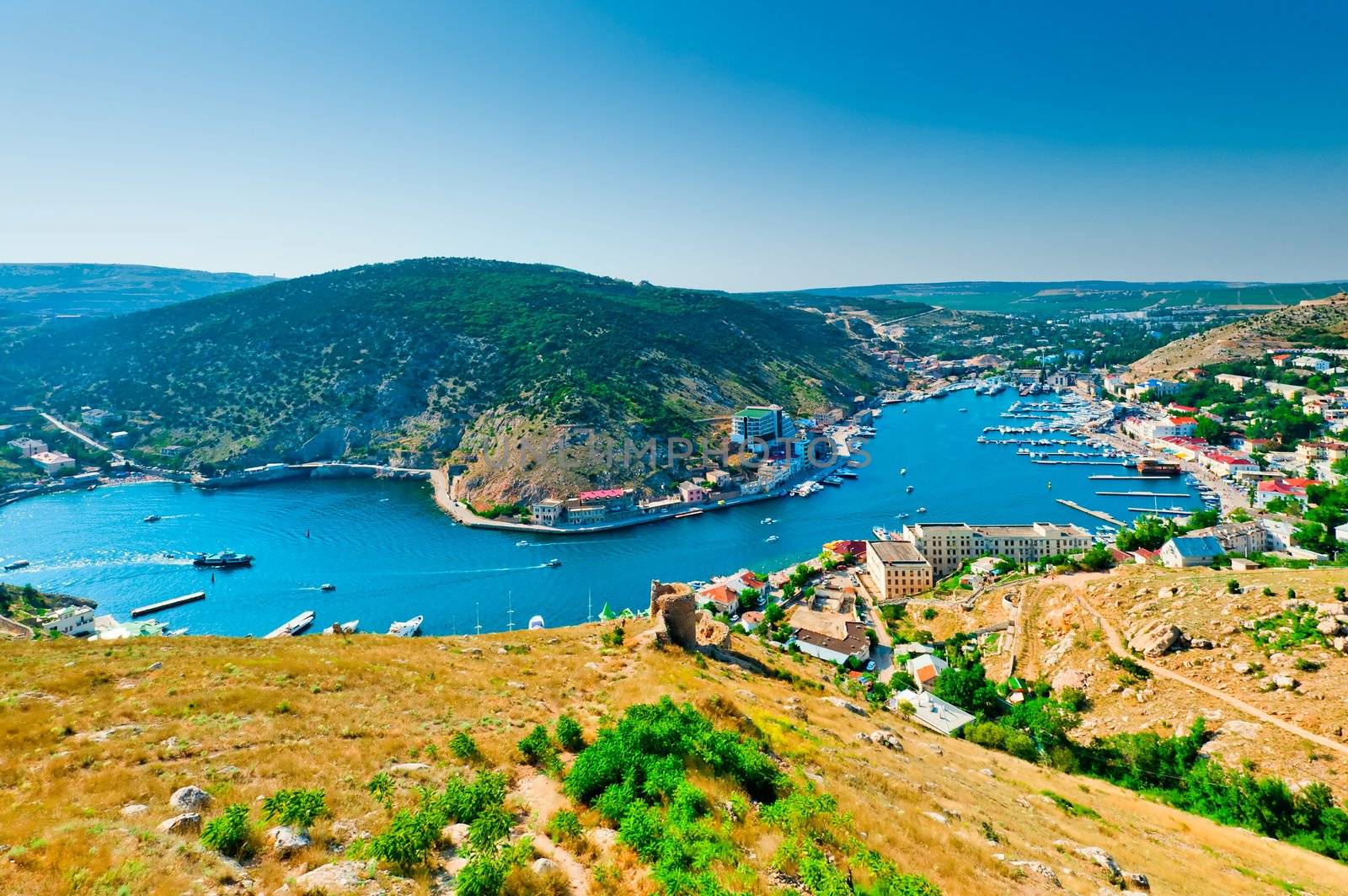 Views of the picturesque bay of Balaklava and the remains of the fortress Genoese. Crimea. Ukraine