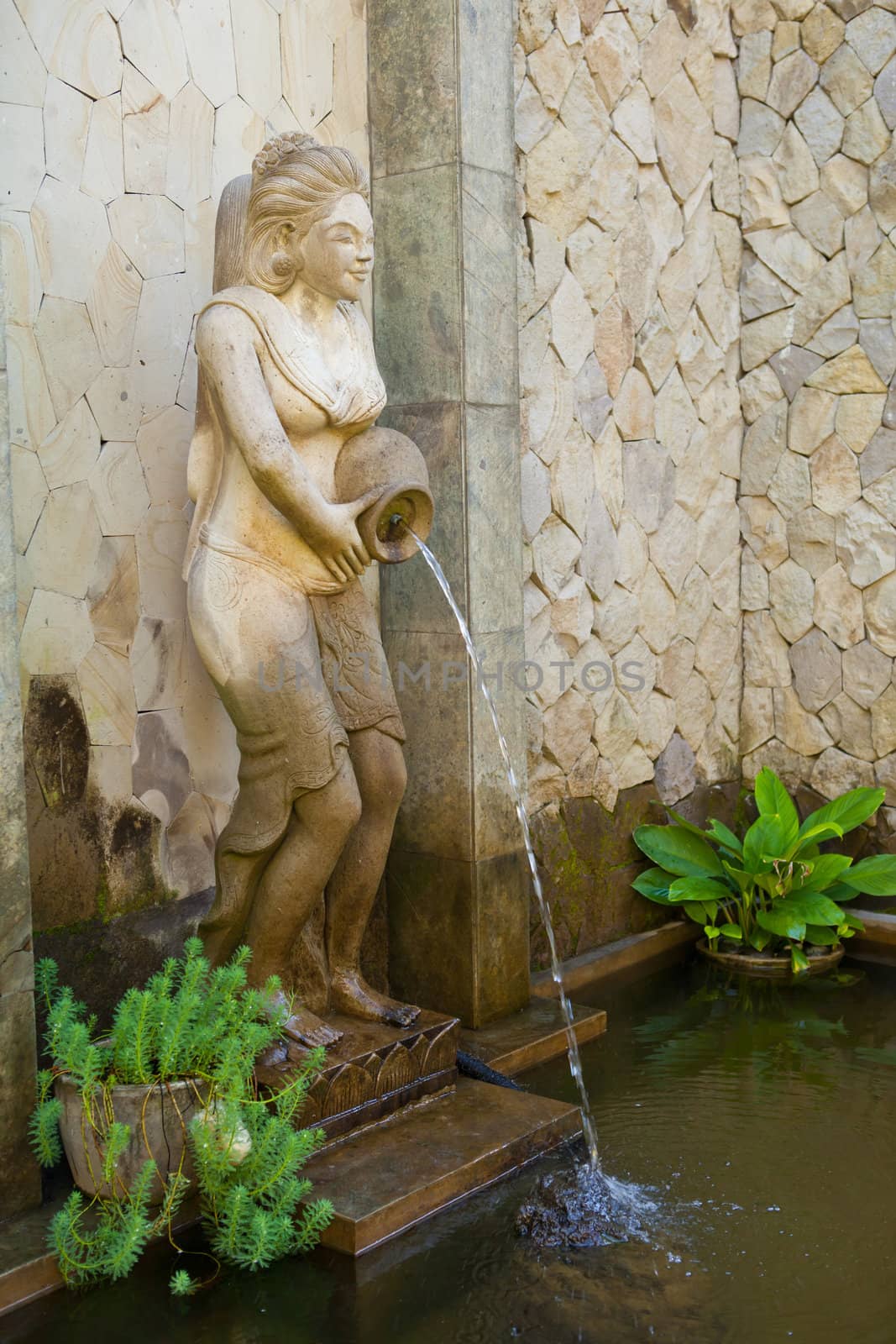 Water is released from the statues in Bali, Indonesia